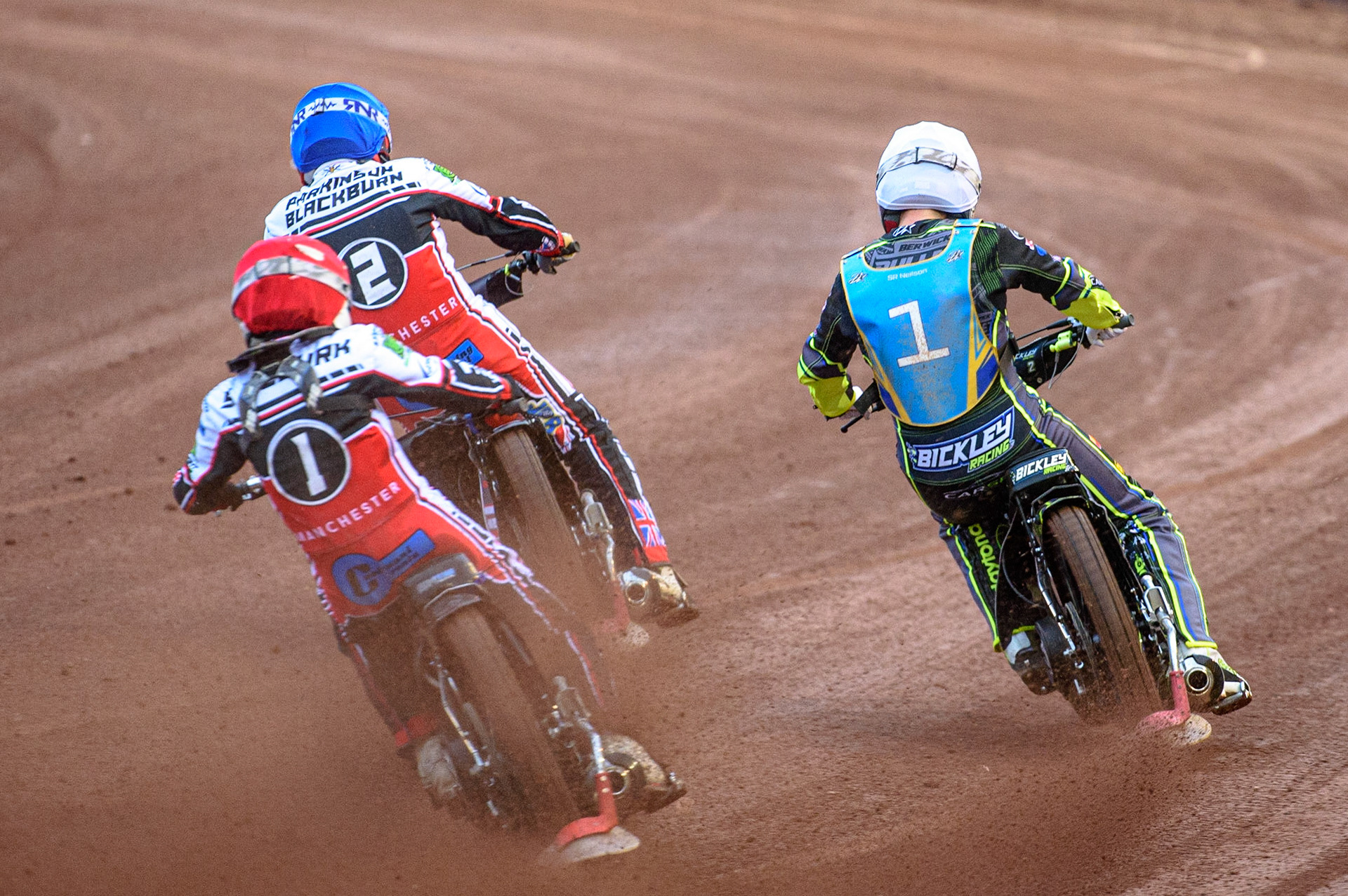 MANCHESTER, UK. AUGUST 20TH Sam McGurk  (Red) chases Jack Parkinson-Blackburn  (Blue) and Kyle Bickley  (White) during the National Development League match between Belle Vue Aces and Armadale Devils at the National Speedway Stadium, Manchester on Friday 20th August 2021. (Credit: Ian Charles | MI News)