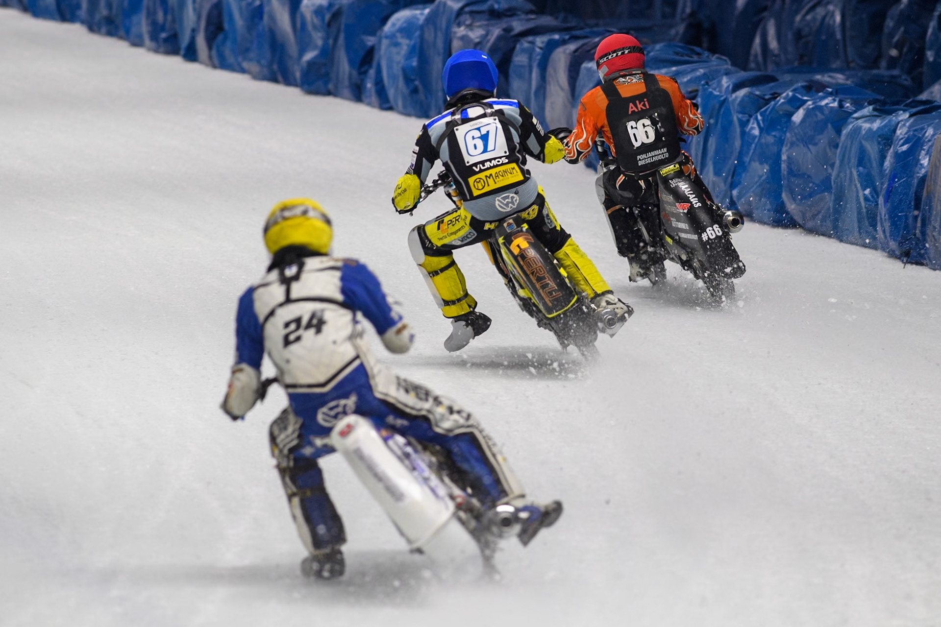 Finland's Max Koivula (24)  (Yellow) chases Finland's Heikki Huusko (67) (Blue) and Finland's Aki Ala-Riihimäki (66) (Red) during the FIM Ice Speedway Gladiators World Championship Final 1 at the Max-Aicher-Arena, Inzell on Saturday 23 March 2024. (Photo: Ian Charles | MI News)