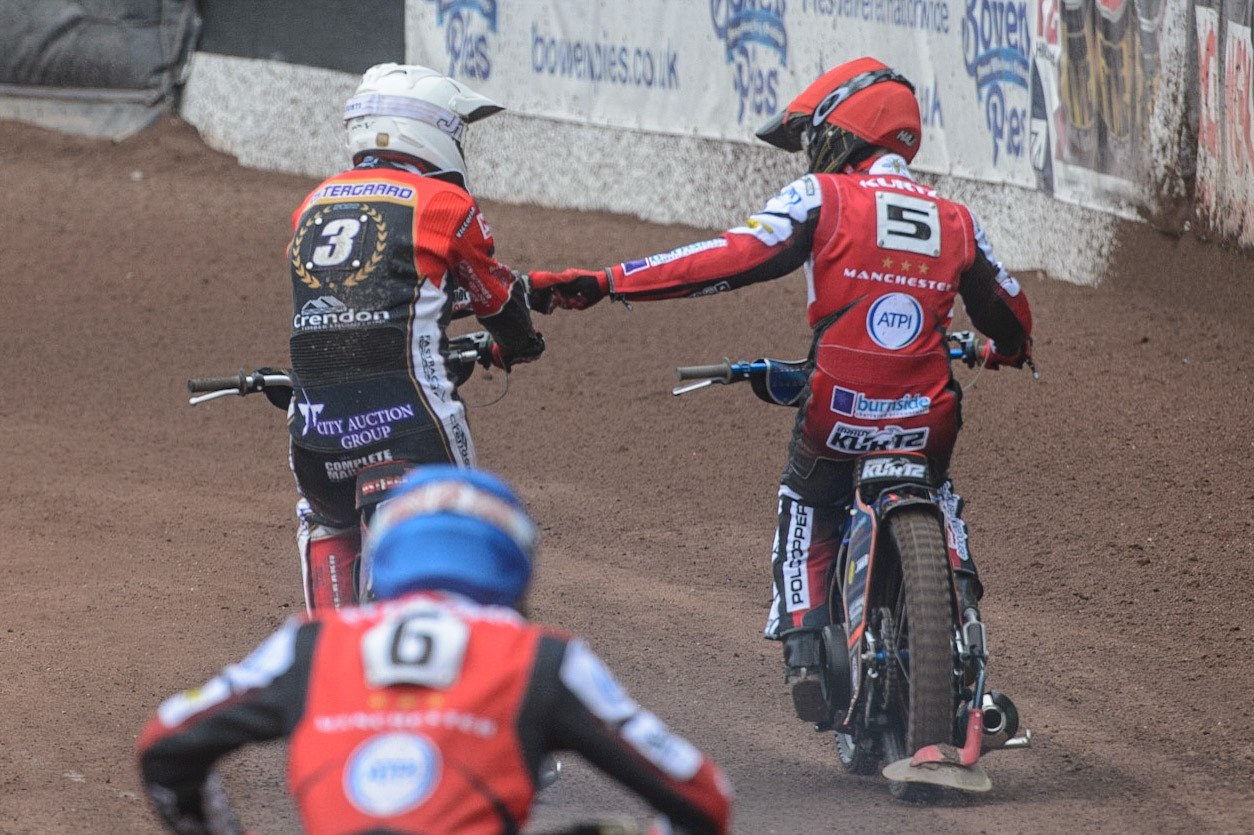 MANCHESTER, UK. MAY 2ND Ulrich Ostergaard  (White) congratulates Brady Kurtz  on his heat win  during the SGB Premiership match between Belle Vue Aces and Peterborough at the National Speedway Stadium, Manchester on Monday 2nd May 2022. (Credit: Ian Charles | MI News)