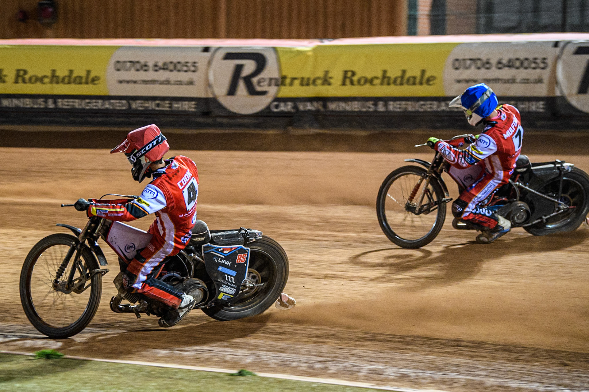 Zach Cook of Belle Vue Aces in Red rides inside team mate Jake Mulford in Blue during the Rowe Motor Oil Premiership match between Belle Vue Aces and King's Lynn Stars at the National Speedway Stadium, Manchester on Monday 5th April 2025. (Photo: Ian Charles | MI News)