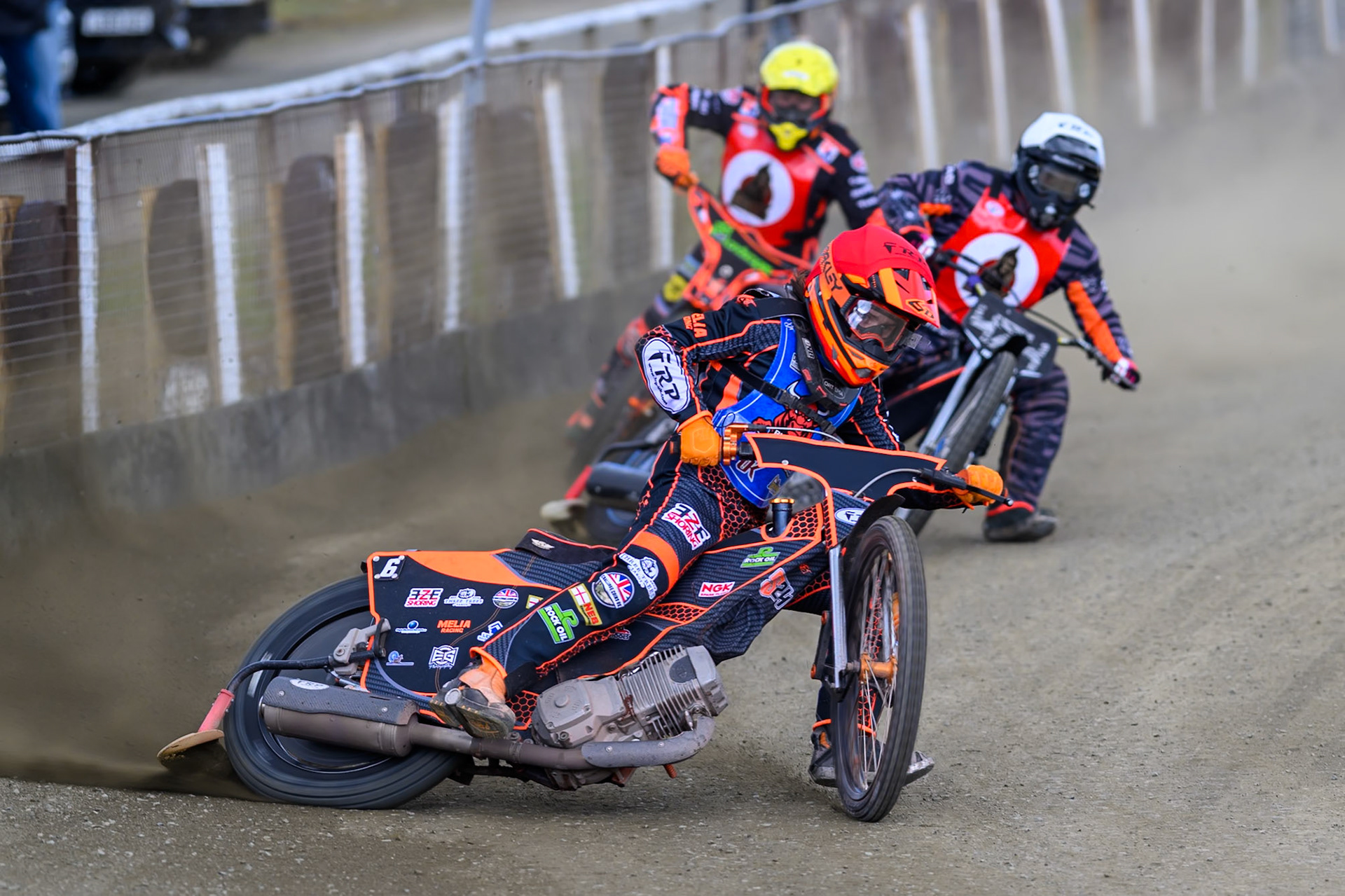 Jack Smith of Buxton Bulls   in Red leading Jack Roberts of NDL Nomads    in White and Alex Spooner of NDL Nomads   in Yellow during the  Challenge match between Buxton Bulls and NDL Nomads at Hi-Edge Speedway, Buxton on Sunday 19th April 2026. (Photo: Ian Charles | MI News)