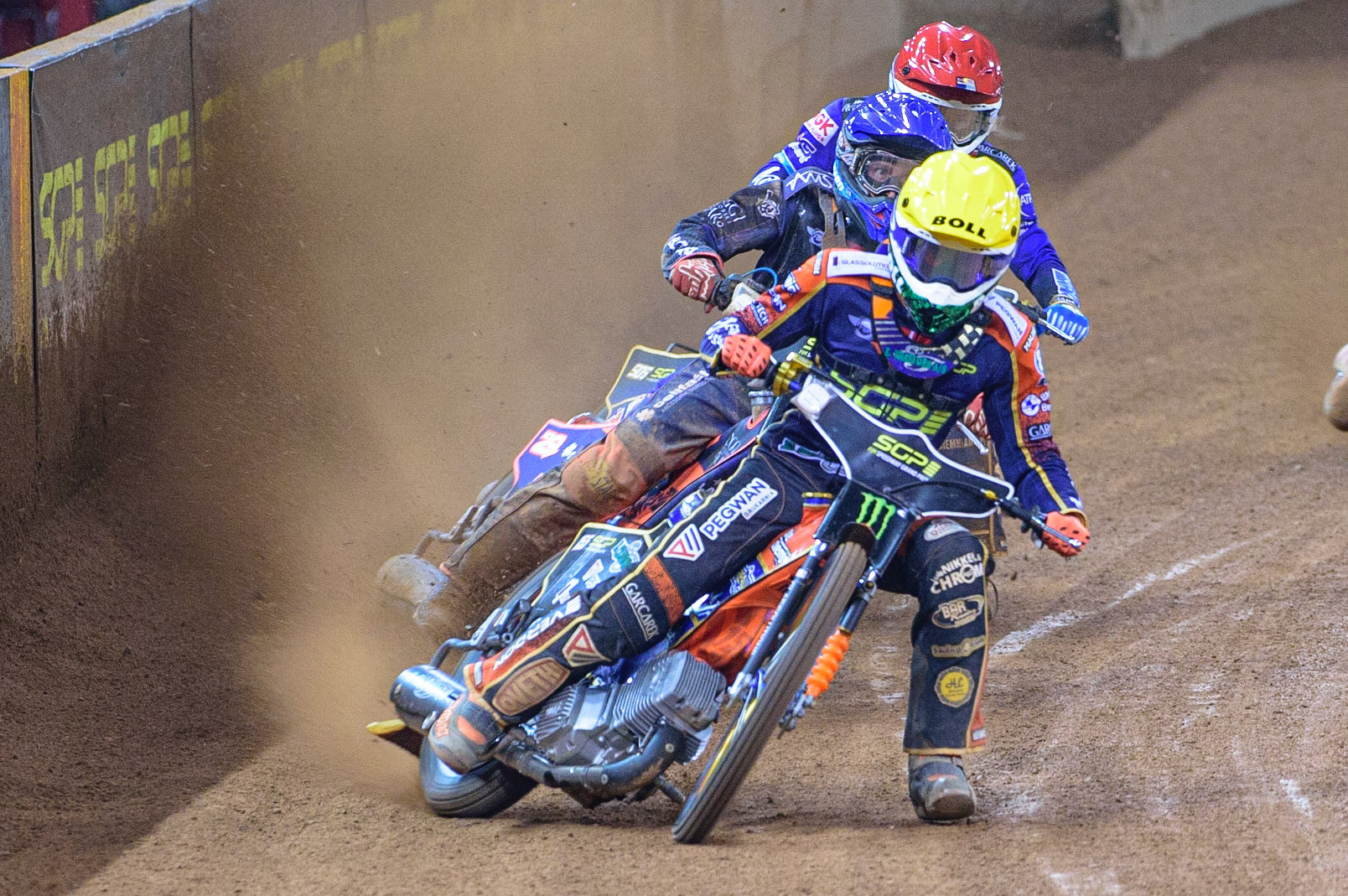 Mikkel Michelsen (155) (Yellow) leads Andžejs Ļebedevs (29) (Blue) and Robert Lambert (505) (Red) during the FIM  Speedway Grand Prix of Great Britain at the Principality Stadium, Cardiff on Saturday 13th August 2022. (Credit: Ian Charles | MI News