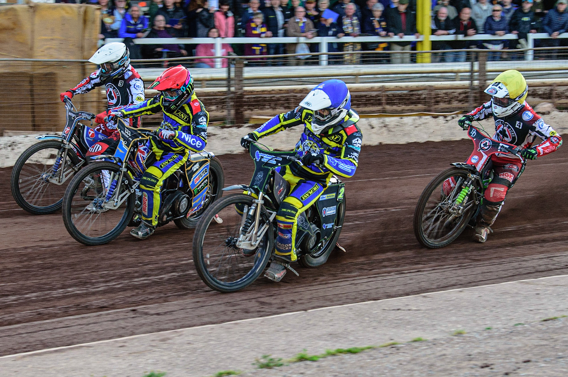 SHEFFIELD, UK. MAY 26TH  Jack Holder  (Red) and Craig Cook  (Blue) lead Matej Žagar  (White) and Charles Wright  (Yellow) into the first turn during the SGB Premiership match between Sheffield Tigers and Belle Vue Aces at Owlerton Stadium, Sheffield on Thursday 26th May 2022. (Credit: Ian Charles | MI News)