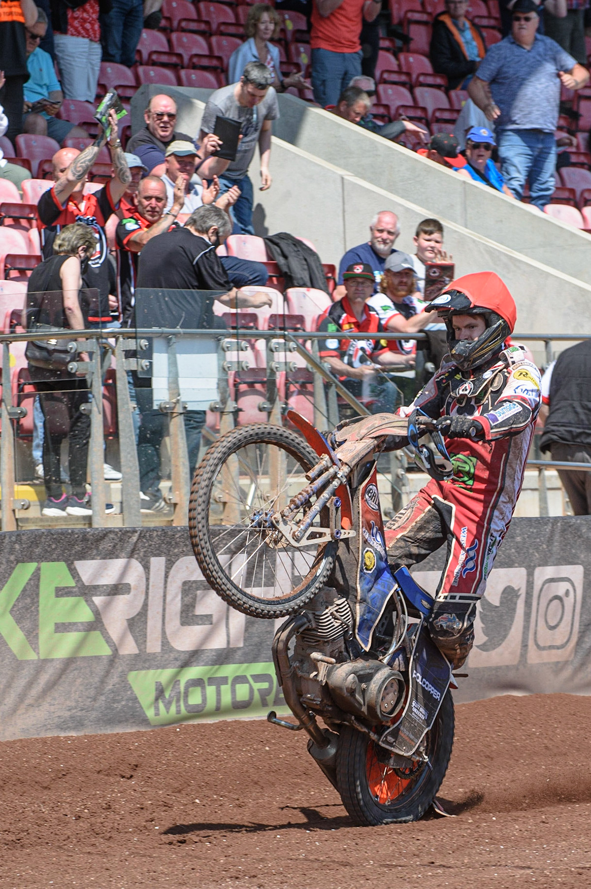 MANCHESTER, UK. MAY 31ST  Brady Kurtz  celebrates with a wheelie during the SGB Premiership match between Belle Vue Aces and Peterborough at the National Speedway Stadium, Manchester on Monday 31st May 2021. (Credit: Ian Charles | MI News)