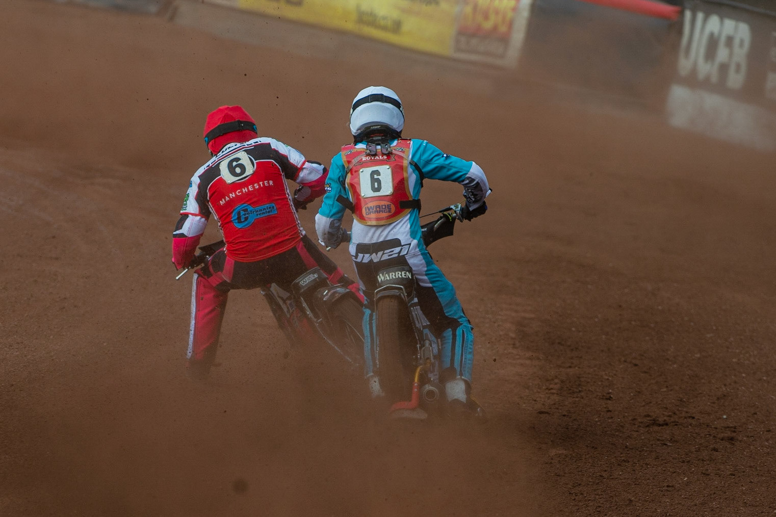 MANCHESTER, UK. JULY 2ND  Sam Woolley  (Red) passes Josh Warren  (White) during the National Development League match between Belle Vue Colts and Kent Royals at the National Speedway Stadium, Manchester on Friday 2nd July 2021. (Credit: Ian Charles | MI News)