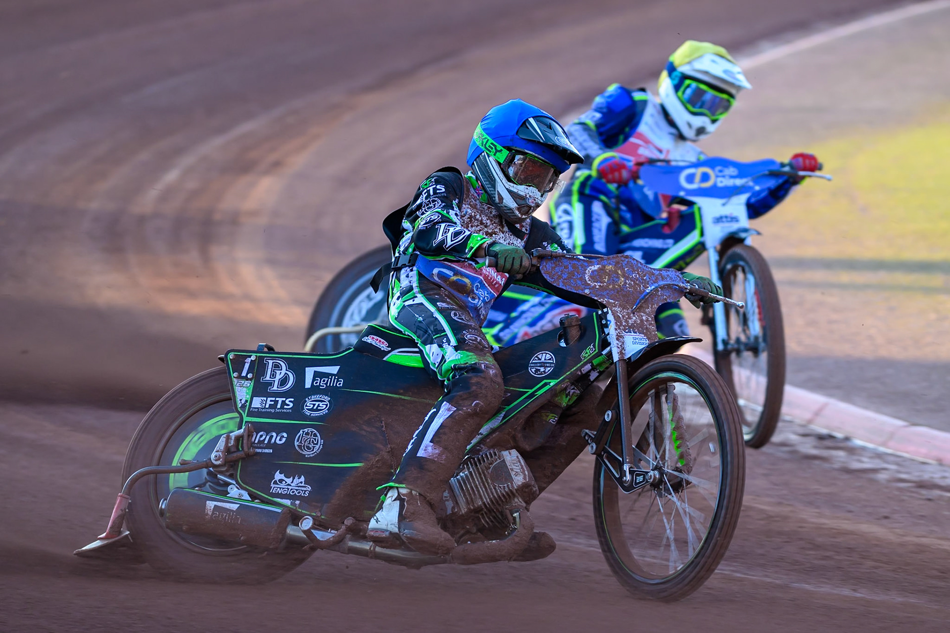 Charles Wright (11) in Blue rides outside Jake Mulford (12) in Yellow during the Cab Direct British Speedway Championship Final at the National Speedway Stadium, Manchester on Saturday 15th August 2026. (Photo: Ian Charles | MI News)