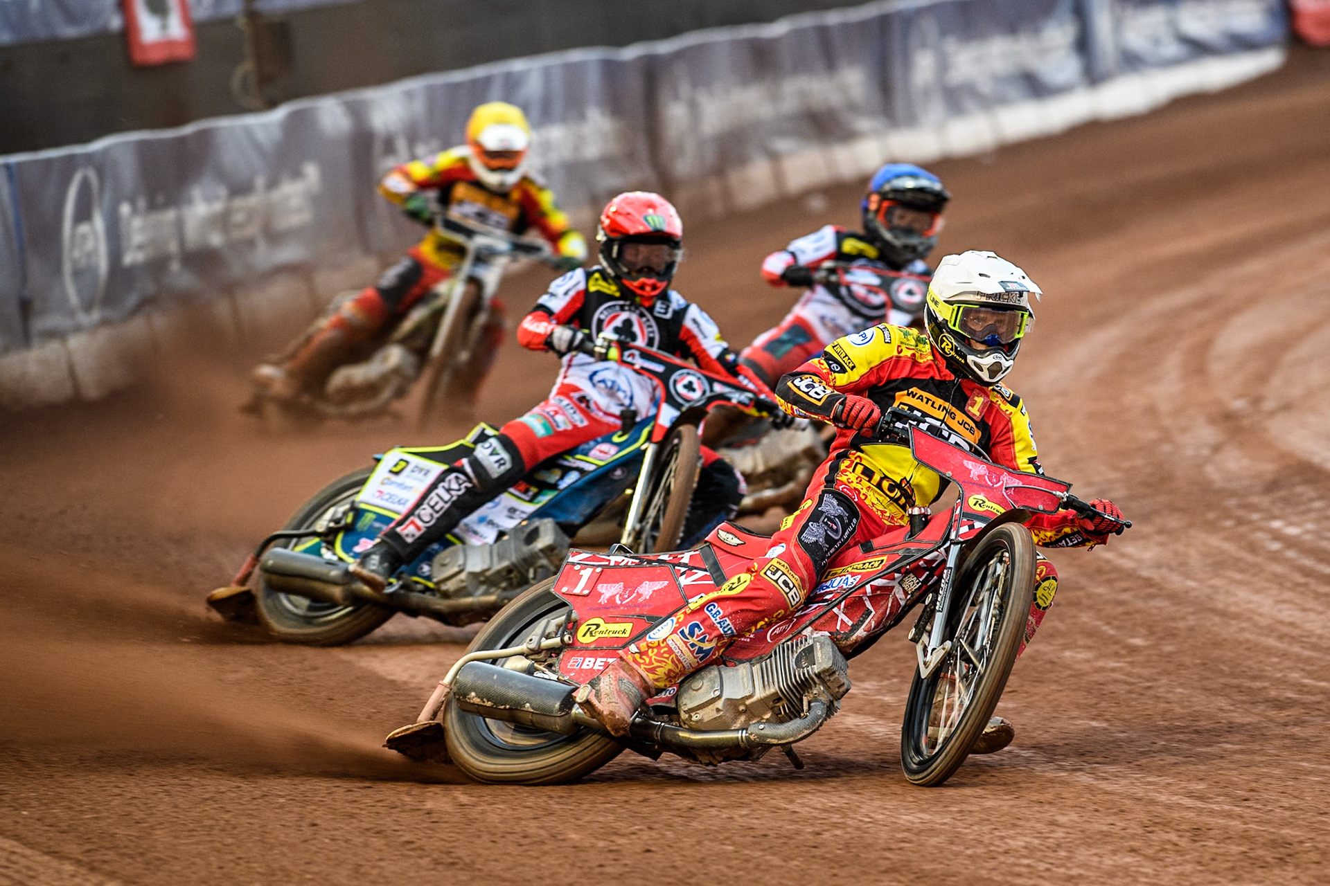 Leicester Lions' Max Fricke in White leading Belle Vue Aces' Jaimon Lidsey in Red Belle Vue Aces' Ben Cook in Blue and Leicester Lions' Richard Lawson in Yellow during the Rowe Motor Oil Premiership match between Belle Vue Aces and Leicester Lions at the National Speedway Stadium, Manchester on Monday 24th June 2024. (Photo: Ian Charles | MI News)