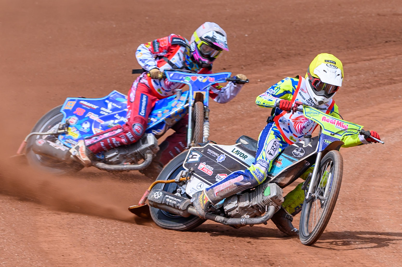 BRITISH YOUTH CHAMPIONSHIP (500cc): Harry Fletcher (23) in Yellow leading Stene Pijper (159) in White during the British Youth Speedway Championship at the National Speedway Stadium, Manchester on Sunday 10th May 2026. (Photo: Ian Charles | MI News)