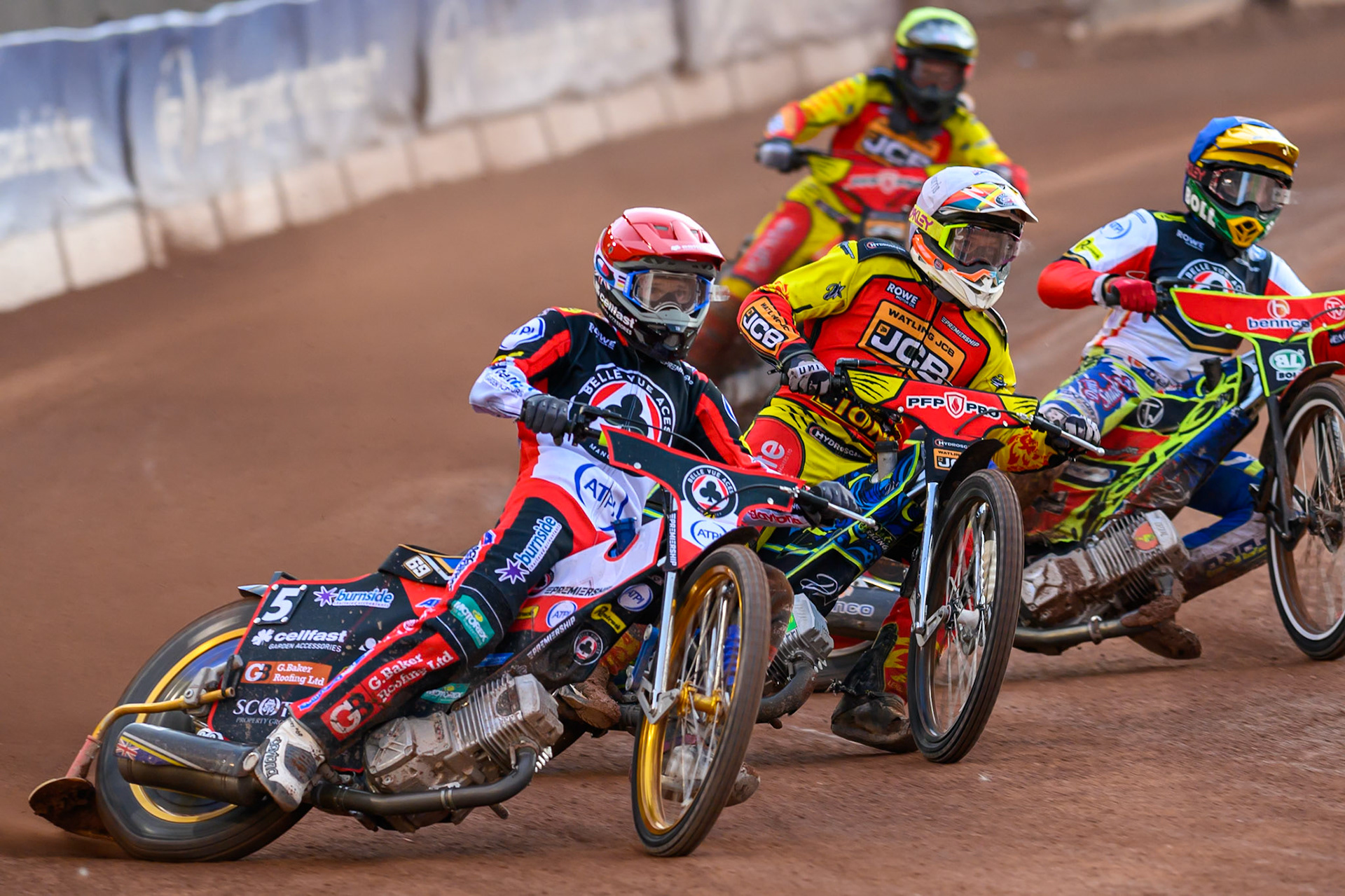 Jason Doyle of Belle Vue Aces in Red rides outside Nick Morris of Leicester Lions in White  and Mitch McDiarmid, Guest Rider for Belle Vue Aces in Blue  with Dan Thompson of Leicester Lions in Yellow behind during the Rowe Motor Oil Premiership match between Belle Vue Aces and Leicester Lions at the National Speedway Stadium, Manchester on Monday 3rd August 2026. (Photo: Ian Charles | MI News)