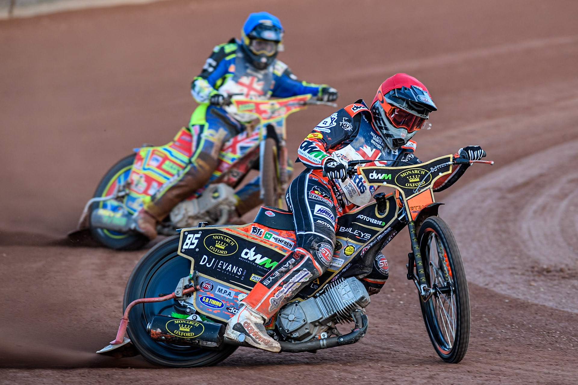 Jordan Jenkins in Red leading Simon Lambert in Blue during the Attis Insurance Sports Division British Speedway Championship Final at the National Speedway Stadium, Manchester on Saturday 8th June 2024. (Photo: Ian Charles | MI News)