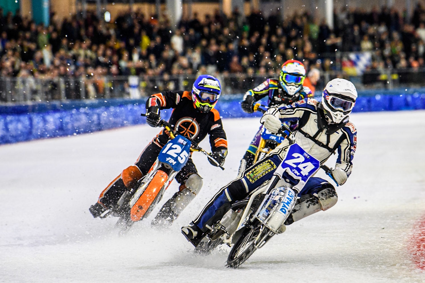 Max Koivula (24) of Finland in White leading Sebastian Reitsma (125) of The Netherlands in Blue and Maximilian Niedermaier (38) of Germany in Red during the FIM Ice Speedway Gladiators World Championship, Final 4 at the Ice Stadium, Thialf, Heerenveen on Sunday 6th April 2025. (Photo: Ian Charles | MI News)