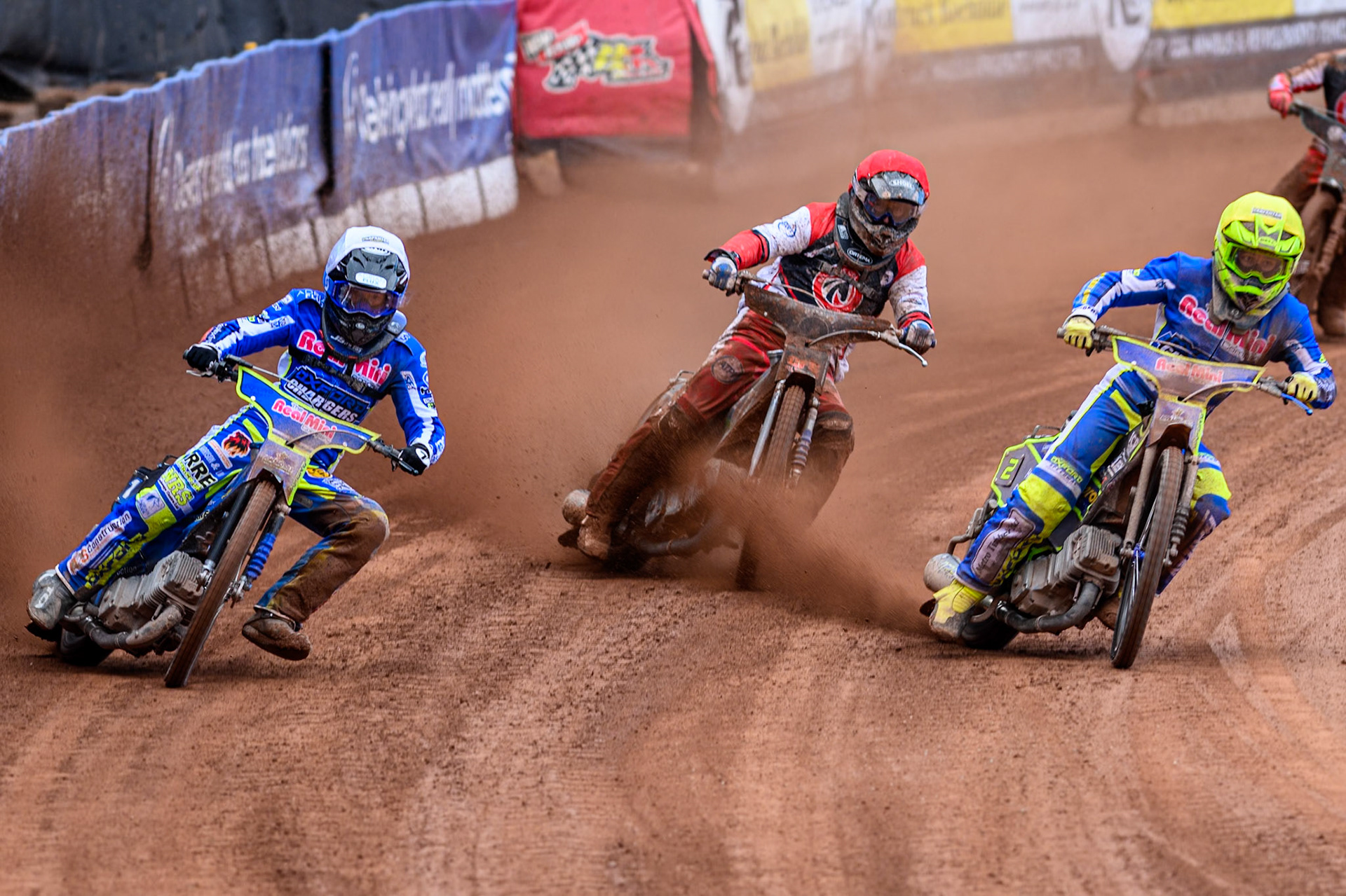 Oxford Chargers' Jody Scott  in White and Oxford Chargers' Jacob Clouting  in Yellow leading Belle Vue Colts' Jack Kingston  in Red during the WSRA National Development League match between Belle Vue Colts and Oxford Chargers at the National Speedway Stadium, Manchester on Sunday 1st June 2025. (Photo: Ian Charles | MI News)