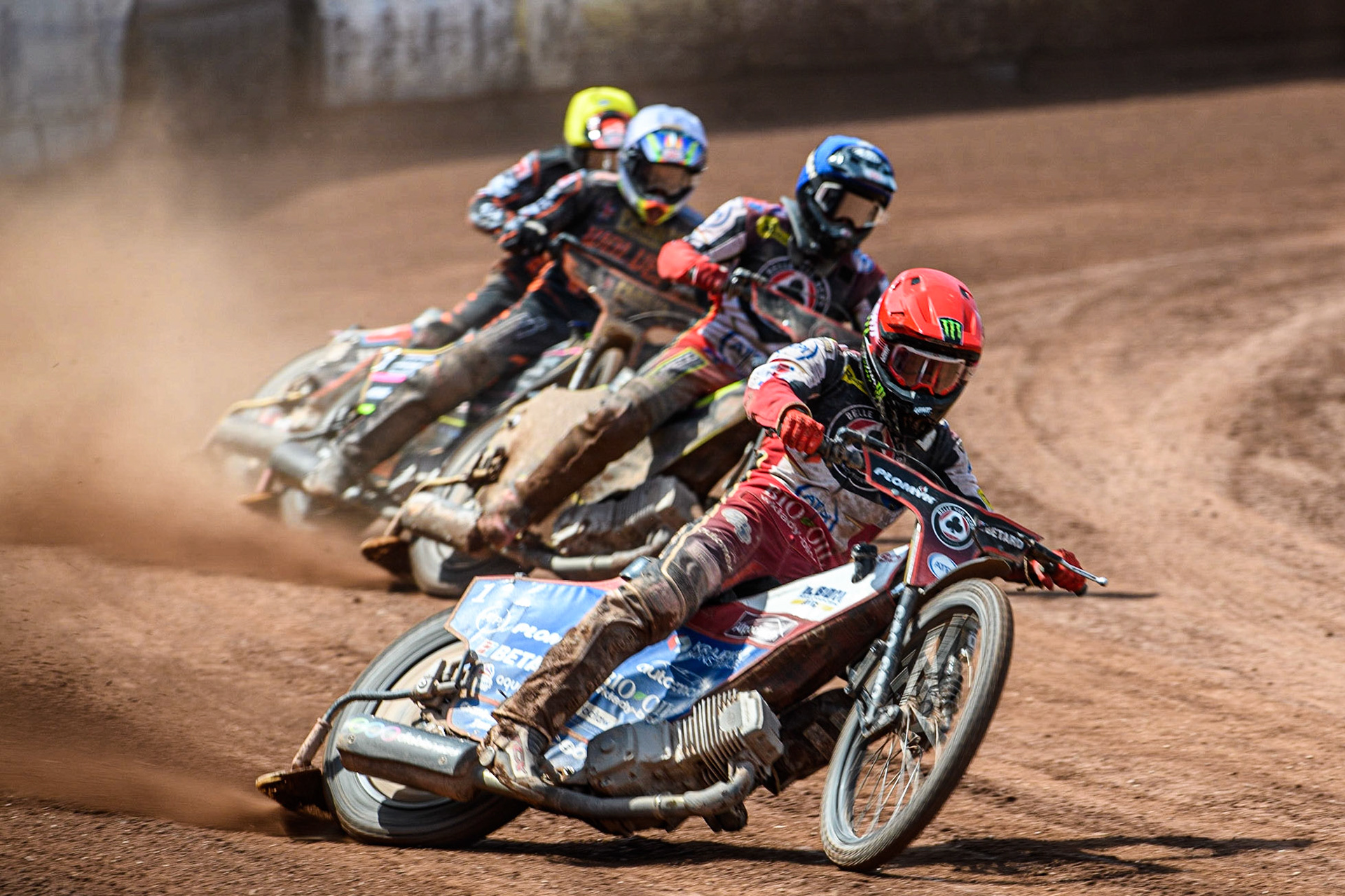Dan Bewley (Red) leads Tom Brennan (Blue) Leon Flint (White) and Zach Cook (Yellow) during the Sports Insure Premiership match between Belle Vue Aces and Wolverhampton Wolves at the National Speedway Stadium, Manchester on Monday 29th May 2023. (Photo: Ian Charles | MI News)