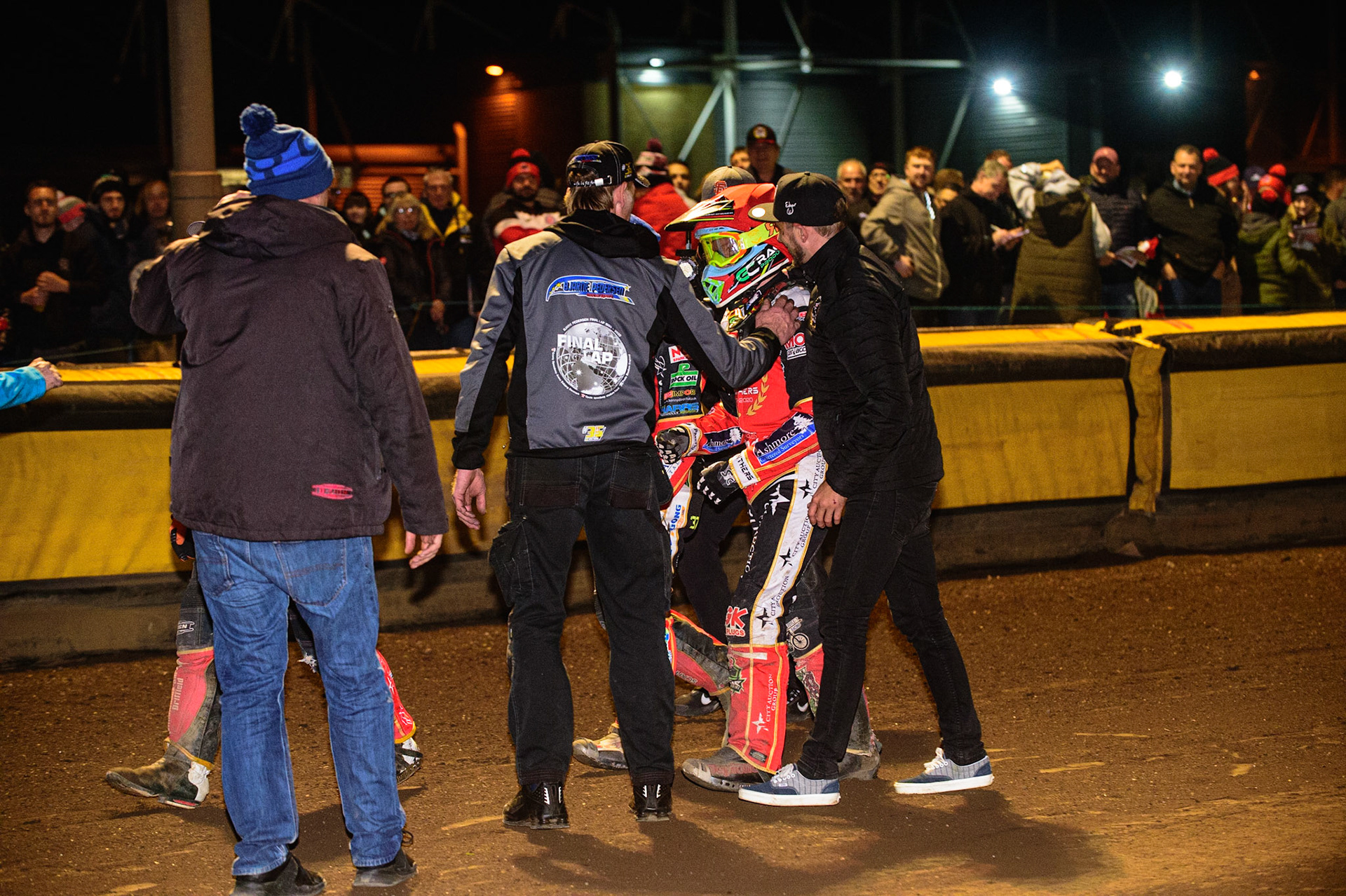 PETERBOROUGH, UK. OCT 14TH Michael Palm Toft  is congratulated by the Panthers support staff during the SGB Premiership Grand Final 2nd leg between Peterborough and Belle Vue Aces at East of England Showground, Peterborough on Thursday 14th October 2021. (Credit: Ian Charles | MI News)