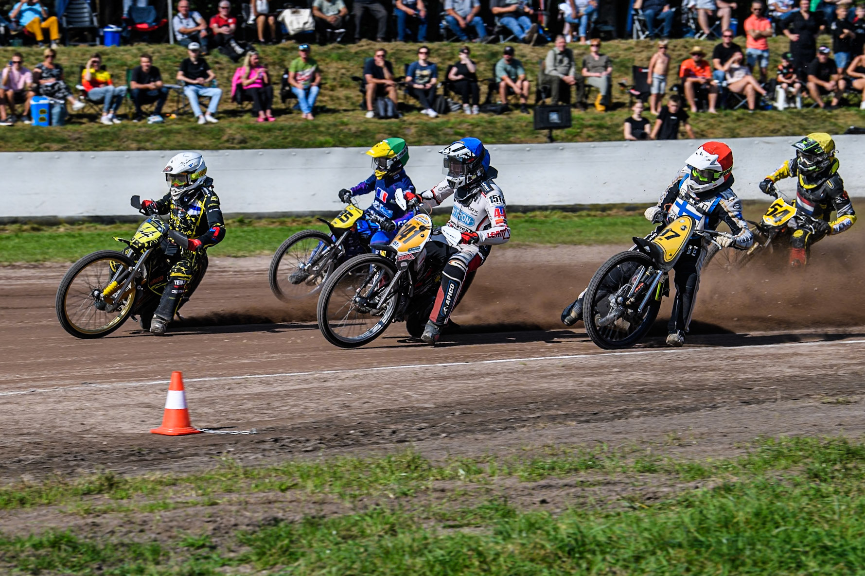 Tero Aarnio (44) of Finland in White leading Andrew Appleton (141) of Great Britain in Blue, Jordan Dubernard (85) of France in Green, Henri Ahlbom (97) of Finland in Red and Mika Meijer (54) of The Netherlands in Yellow  during the FIM Long Track World Championship Final 5 at the Speed Centre Roden, Roden, Netherlands on Sunday 22nd September 2024. (Photo: Ian Charles | MI News)