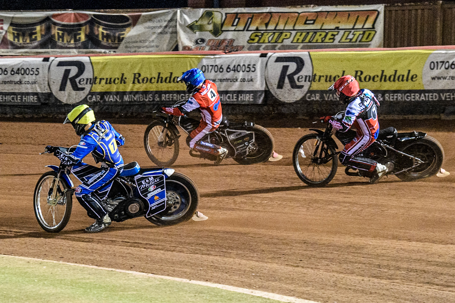 Edinburgh Monarchs' Guest Rider Lee Harrison in Yellow rides inside Belle Vue Colts' Matt Marson in Blue and Belle Vue Colts' Harry McGurk in Red during the WSRA National Development League match between Belle Vue Aces and Edinburgh Monarchs at the National Speedway Stadium, Manchester on Friday 30th August 2024. (Photo: Ian Charles | MI News)