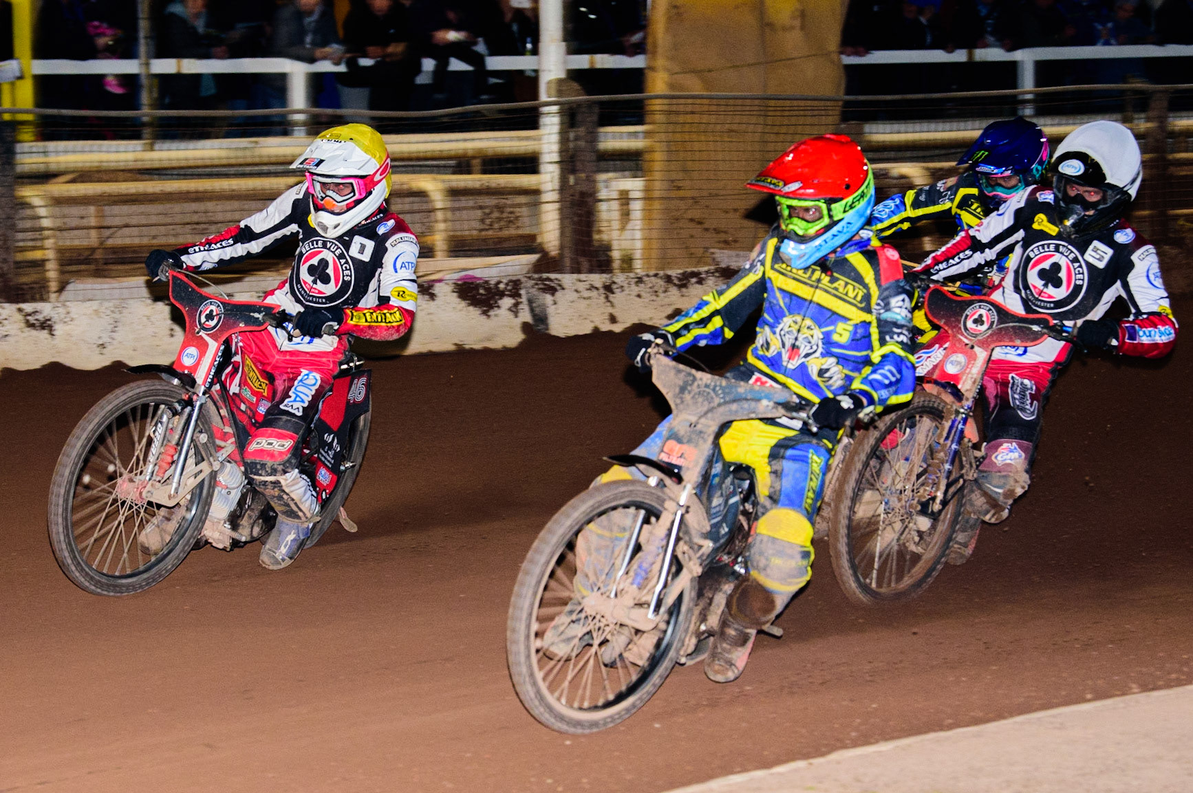 SHEFFIELD, UK. APR 14TH   Adam Ellis  (Red) inside Max Fricke  (Yellow) with Brady Kurtz  (White) behind during the SGB Premiership League Cup match between Sheffield Tigers and Belle Vue Aces at Owlerton Stadium, Sheffield on Thursday 14th April 2022. (Credit: Ian Charles | MI News)