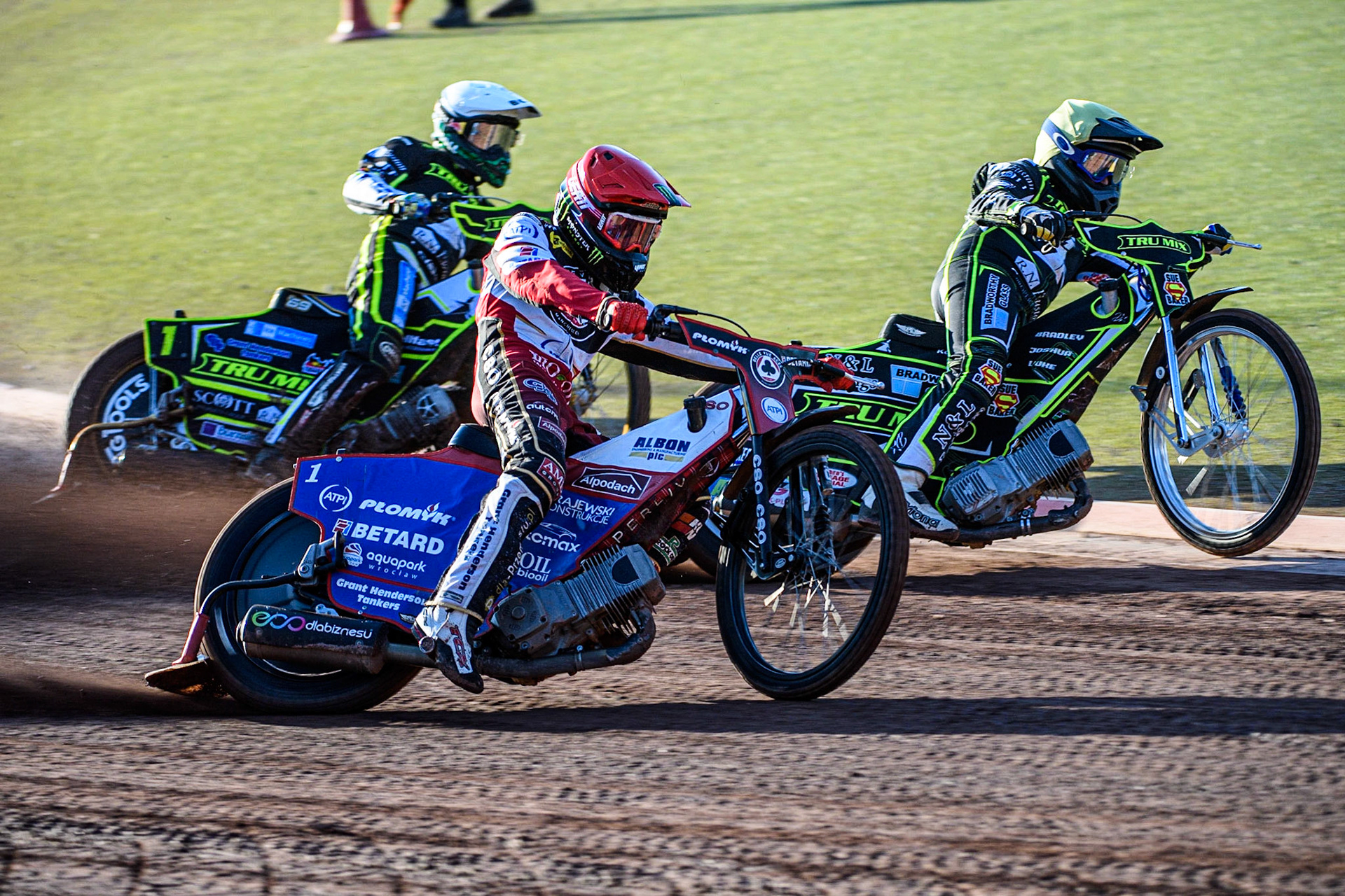 Dan Bewley (Red) outside Ben Barker (Yellow) and Jason Doyle (White) during the Sports Insure Premiership match between Belle Vue Aces and Ipswich Witches at the National Speedway Stadium, Manchester on Monday 5th June 2023. (Photo: Ian Charles | MI News)