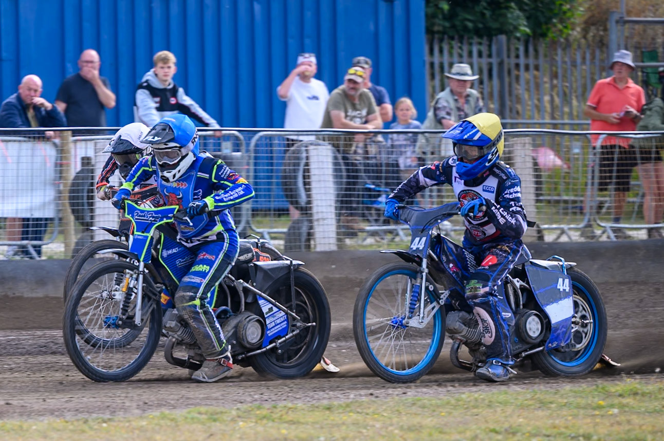 Arran Butcher of Buxton Bulls in Blue leading Charlie Southwick of Middlesborough Tigers in Yellow and Harry Sadler of Middlesborough Tigers in White during the WSRA National Development League match  between Buxton Bulls and Middlesborough Tigers at Hi-Edge Speedway, Buxton on Sunday 16th August 2026. (Photo: Ian Charles | MI News)