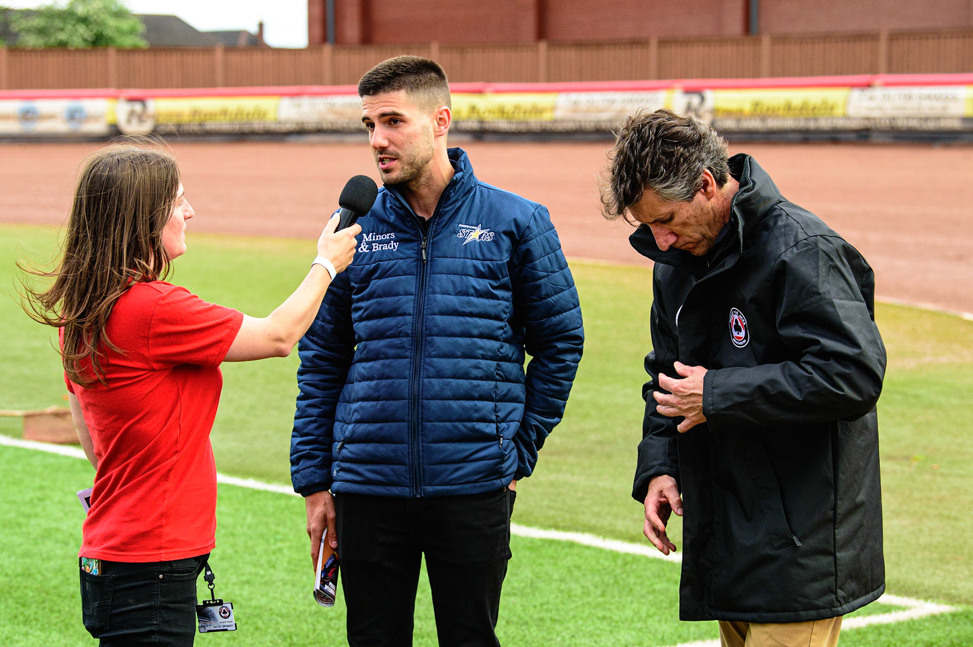 MANCHESTER, UK. MAY 16TH Meeting presenter Hayley Bromley interviews King’s Lynn Minors &amp; Brady Stars  manager Alex Brady and Belle Vue manager Mark Lemon  during the SGB Premiership match between Belle Vue Aces and King's Lynn Stars at the National Speedway Stadium, Manchester on Monday 16th May 2022. (Credit: Ian Charles | MI News)