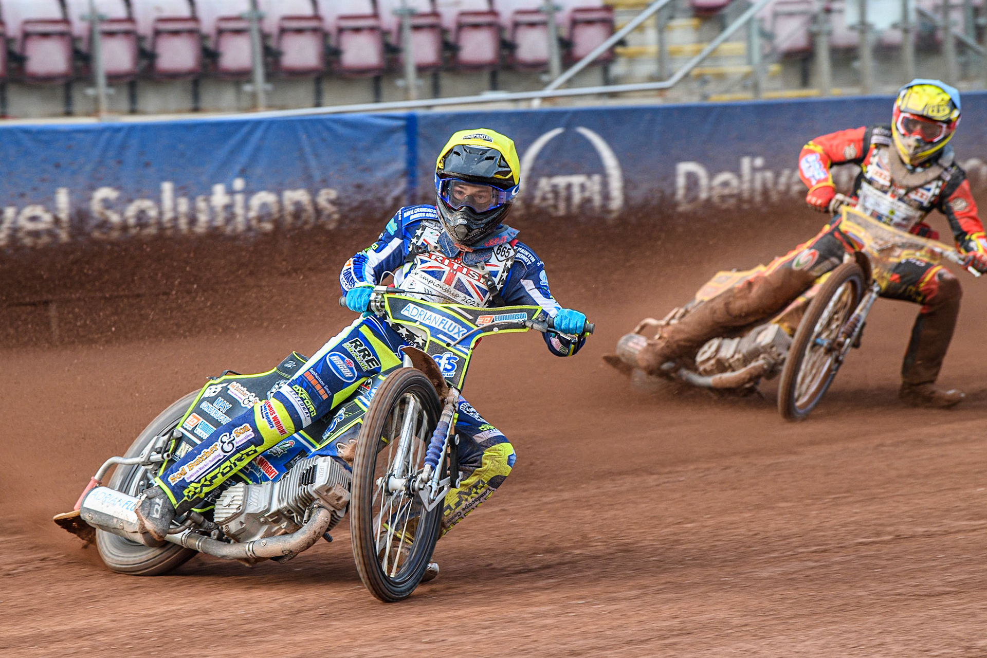 Jody Scott (Yellow) leads Max James  (Blue) during the British Youth Speedway Championships at the National Speedway Stadium, Manchester on Friday 21st July 2023. (Photo: Ian Charles | MI News)