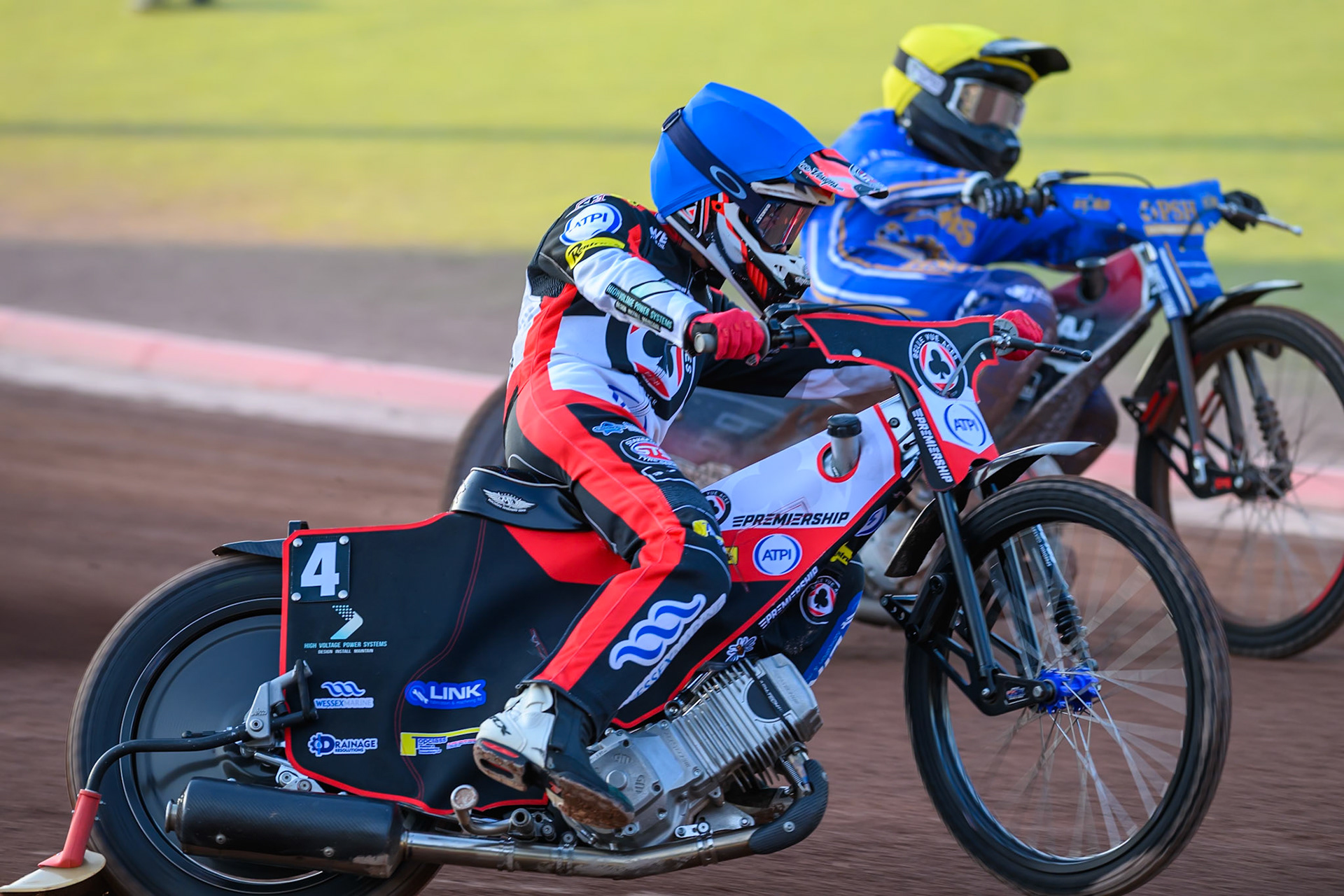 Zach Cook of Belle Vue Aces in Blue rides outside Ben Cook of Kings Lynn Stars in Yellow during the Rowe Motor Oil Premiership match between Belle Vue Aces and King's Lynn Stars at the National Speedway Stadium, Manchester on Monday 10th August 2026. (Photo: Ian Charles | MI News)