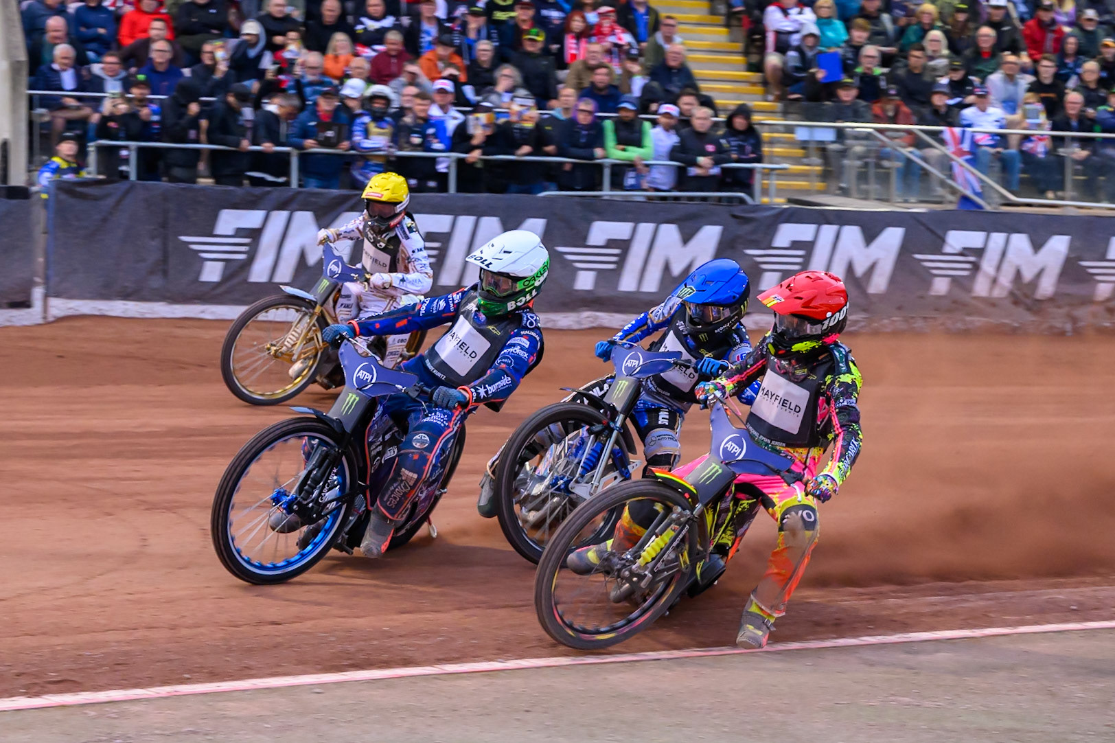 Brady Kurtz (101) of Australia in White leading Michael Jepsen Jensen (52) of Denmark in Red, Jack Holder (25) of Australia in Blue and Anders Thomsen (105) of Denmark in Yellow during the ATPI  FIM Speedway GP of Manchester at the National Speedway Stadium, Manchester on Friday 5th June 2026. (Photo: Ian Charles | MI News)