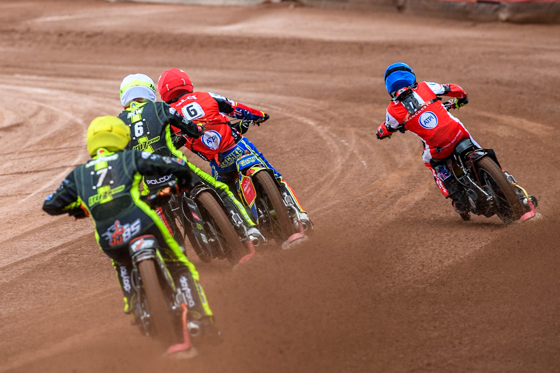 Ipswich Witches' Jordan Jenkins in Yellow and Ipswich Witches' Keynan Rew in White chase Belle Vue Aces' Tate Zischke  in Red and Belle Vue Aces' Connor Bailey  in Blue during the Rowe Motor Oil Premiership match between Belle Vue Aces and Ipswich Witches at the National Speedway Stadium, Manchester on Monday 1st July 2024. (Photo: Ian Charles | MI News)