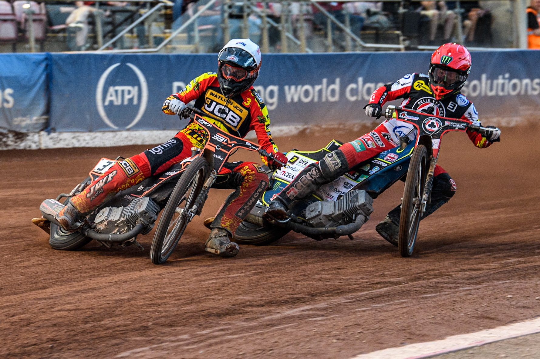 Leicester Lions' Sam Masters in White leading Belle Vue Aces' Jaimon Lidsey in Red during the Rowe Motor Oil Premiership match between Belle Vue Aces and Leicester Lions at the National Speedway Stadium, Manchester on Monday 24th June 2024. (Photo: Ian Charles | MI News)