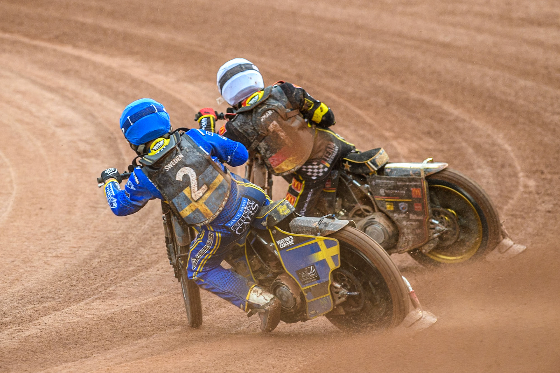 Philip Hellström-Bängs of Sweden in Blue chases Norick Blödorn of Germany in White during the Monster Energy FIM Speedway of Nations 2 (Under 21) Final at the National Speedway Stadium, Manchester on Friday 12th July 2024. (Photo: Ian Charles | MI News)