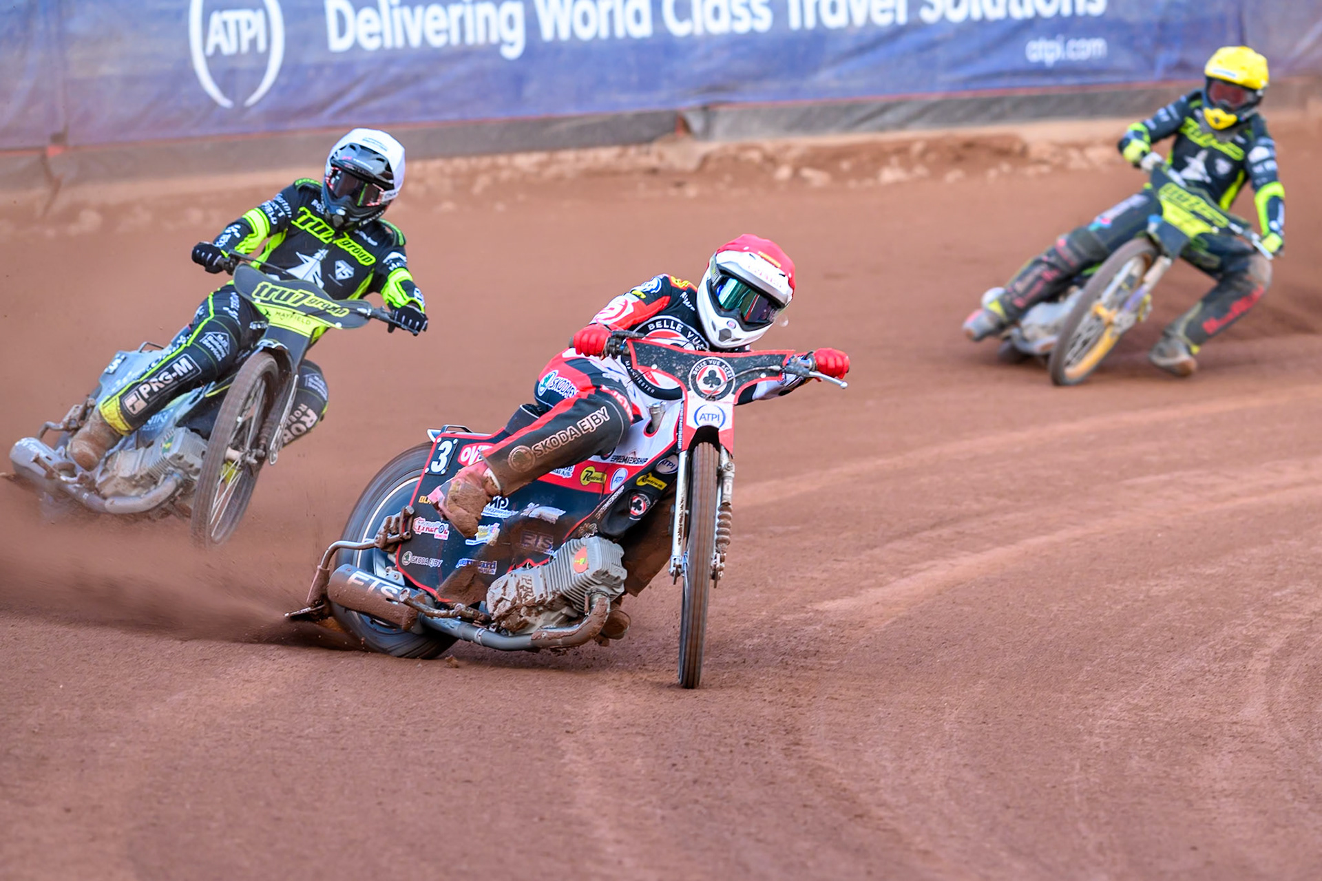 Peter Kildemand of Belle Vue Aces in Red leading Tobiasz Musielak of Ipswich Witches  in White and Philip Hellstrom-Bangs of Ipswich Witches in Yellow during the Rowe Motor Oil Premiership match between Belle Vue Aces and Ipswich Witches at the National Speedway Stadium, Manchester on Saturday 20th June 2026. (Photo: Ian Charles | MI News)