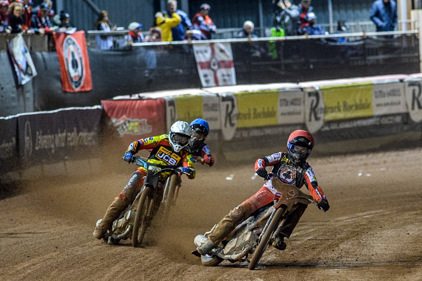 Belle Vue Aces' Brady Kurtz  in Red leading Leicester Lions' Ryan Douglas  in White and Belle Vue Aces' Norick Blodorn  in Blue during the Rowe Motor Oil Premiership Grand Final 1st Leg between Belle Vue Aces and Leicester Lions at the National Speedway Stadium, Manchester on Monday 23rd September 2024. (Photo: Ian Charles | MI News)