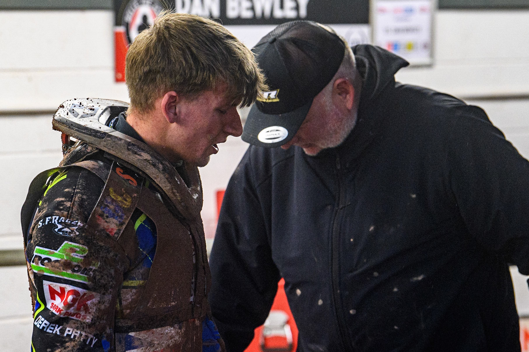 Joe Thompson (left) chats with his father during the Sports Insure British Speedway Final at the National Speedway Stadium, Manchester on Monday 14th August 2023. (Photo: Ian Charles | MI News)