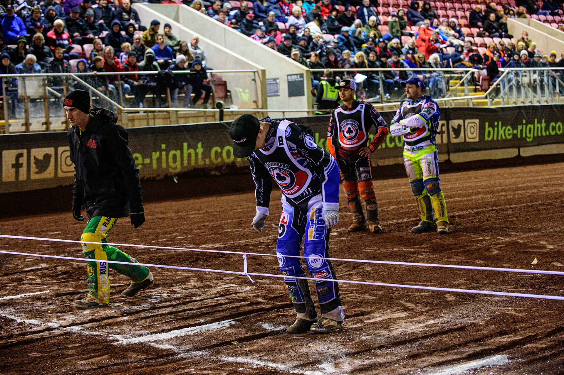 MANCHESTER, UK. OCT 23RD  Max Fricke (left) and Dan Bewley  check the gates watched by Luke Becker  and Chris Harris  during the Peter Craven Memorial Trophy event at the National Speedway Stadium, Manchester on Saturday 23rd October 2021. (Credit: Ian Charles | MI News)