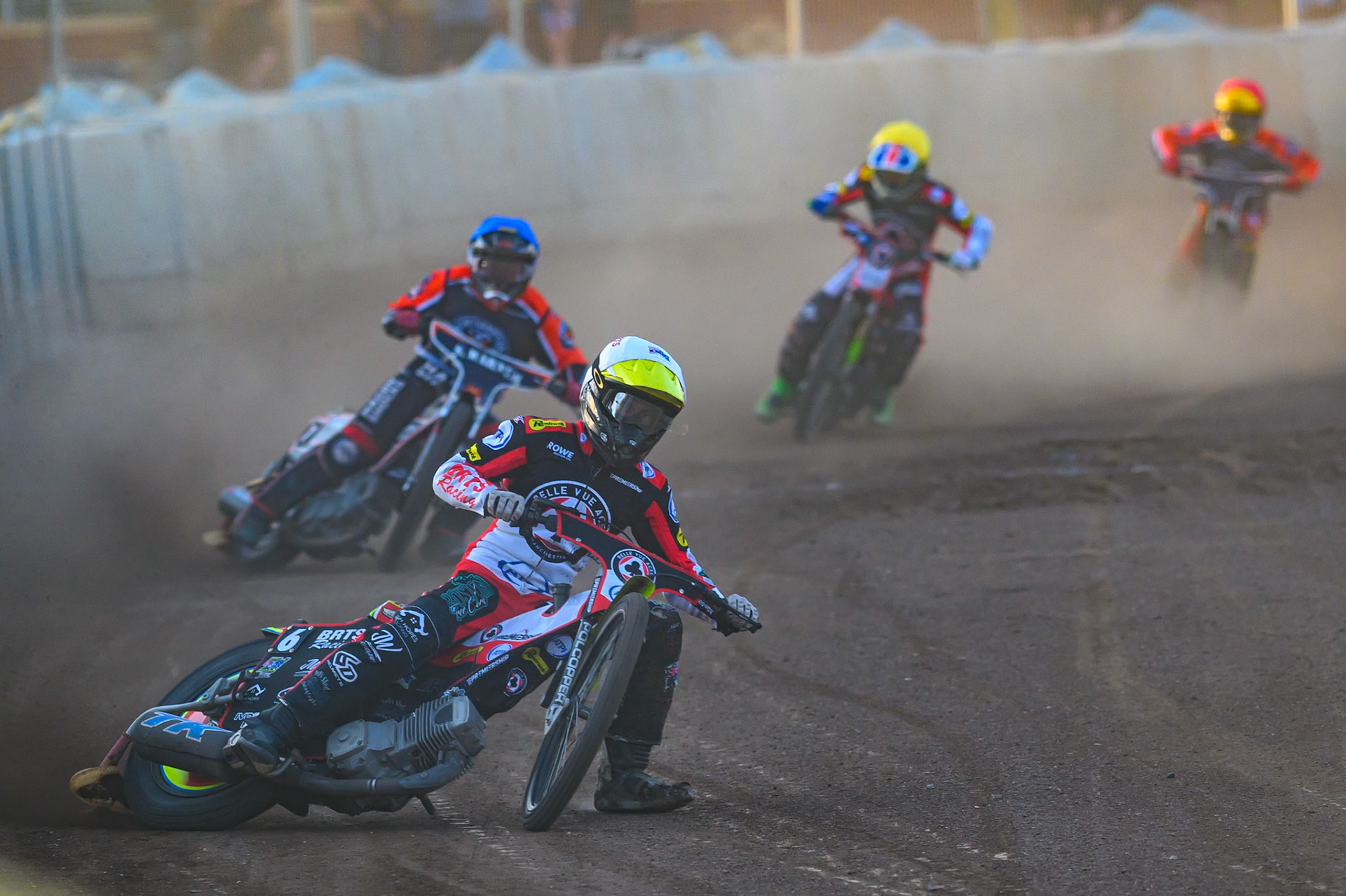 Tate Zischke of Belle Vue Aces  in White leading Sam Hagon, Guest Rider for Northampton Foxes in Blue Will Cairns of Belle Vue Aces in Yellow and Mitch McDiarmid of Northampton Foxes in Red during the Rowe Motor Oil Premiership match between Northampton Foxes and Belle Vue Aces at Northampton International Shaleway, Northampton on Thursday 13th August 2026. (Photo: Ian Charles | MI News)