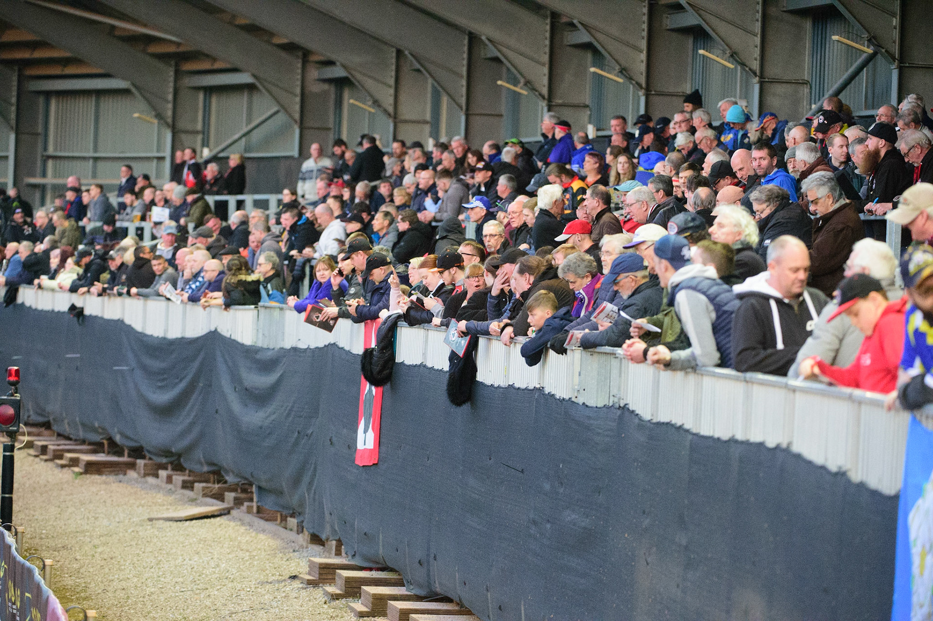 MANCHESTER, UK.  MAR 28TH. Another big crowd in the South Stand  during the SGB Premiership League Cup match between Belle Vue Aces and Sheffield Tigers at the National Speedway Stadium, Manchester on Monday 28th March 2022. (Credit: Ian Charles | MI News)
