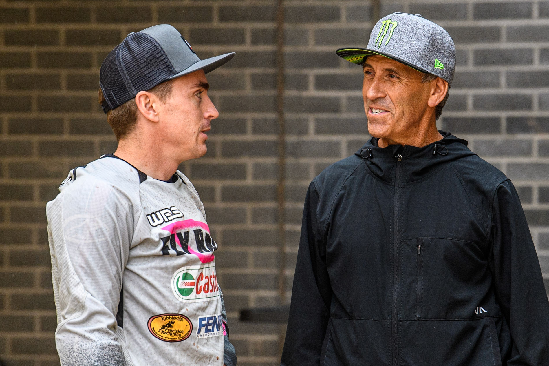 Sammy Halbert (69) from USA (left) chats with fellow American, former World Speedway Champion Greg Hancock during the FIM World Flat Track Championship Round 1 at the National Speedway Stadium, Manchester on Saturday 5th August 2023. (Photo: Ian Charles | MI News)