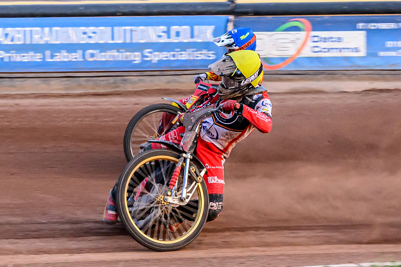 Belle Vue Aces' Norick Blodorn in Yellow rides inside Leicester Lions' Max Fricke in Red during the Rowe Motor Oil Premiership match between Leicester Lions and Belle Vue Aces at the Hydroscand Arena, Leicester on Thursday 19th June 2025. (Photo: Ian Charles | MI News)