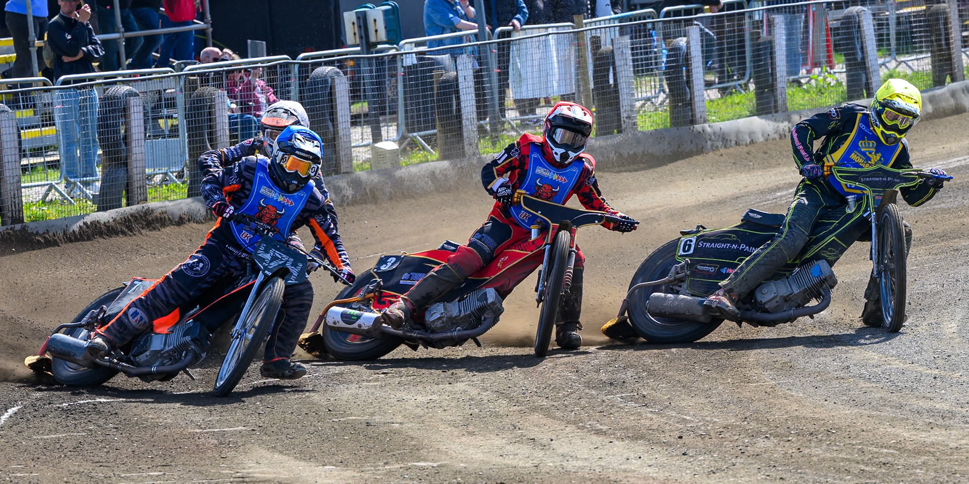 Ben Whalley of Edinburgh Monarchs Academy  in Yellow rides inside Luke Harris of Buxton Bulls  in Red, Jack Roberts of Buxton Bulls  in Blue and Ryan Ingram, Guest Rider for Edinburgh Monarchs Academy in White during the WSRA National Development League match between Buxton Bulls and Edinburgh Monarchs Academy at Hi-Edge Speedway, Buxton on Sunday 14th June 2026. (Photo: Ian Charles | MI News)