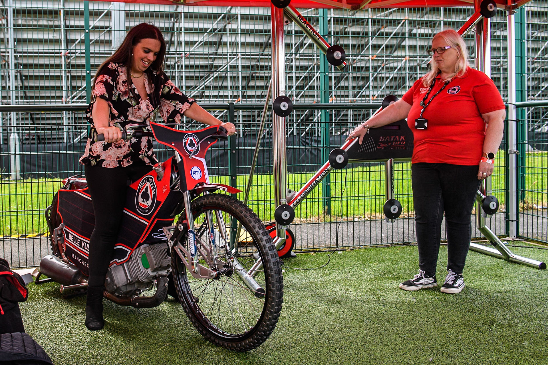Belle Vue fan Selina Scoble tries out the ‘Beat The Starter game during the Monster Energy FIM Speedway of Nations Semi-Final 1 at the National Speedway Stadium, Manchester on Tuesday 9th July 2024. (Photo: Ian Charles | MI News)