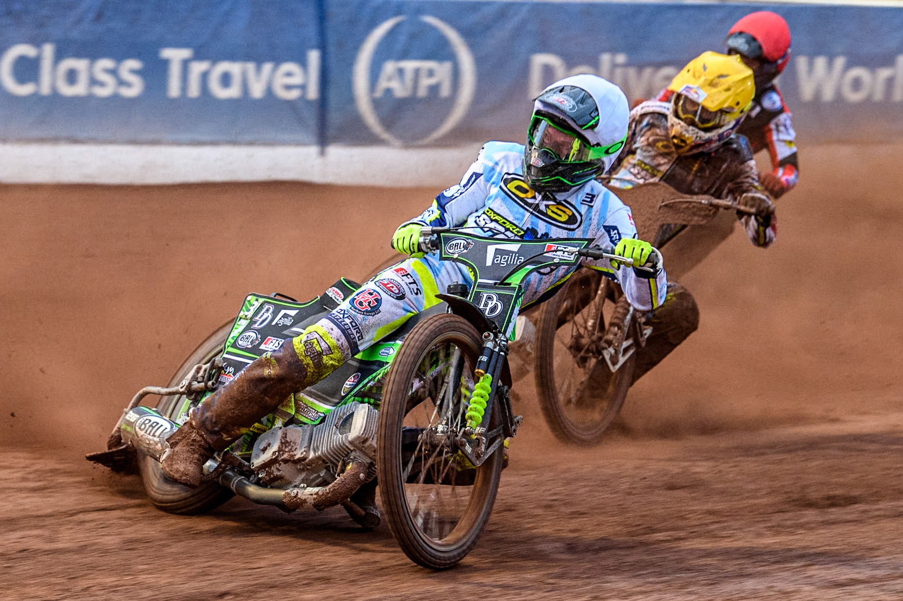 Oxford Spires' Charles Wright in White leading Oxford Spires' Maciej Janowski in Yellow and Belle Vue Aces' Brady Kurtz in Red during the Rowe Motor Oil Premiership match between Belle Vue Aces and Oxford Spires at the National Speedway Stadium, Manchester on Monday 13th May 2024. (Photo: Ian Charles | MI News)