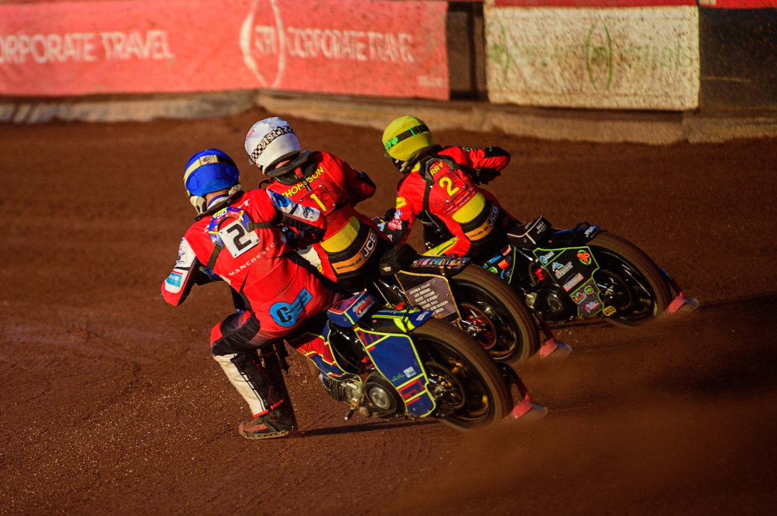 Nathan Ablitt  (Blue) chases Dan Thompson   (White) and Max Perry   (Yellow) during the National Development League match between Belle Vue Aces and Leicester Lions at the National Speedway Stadium, Manchester on Friday 19th August 2022. (Credit: Ian Charles | MI News)