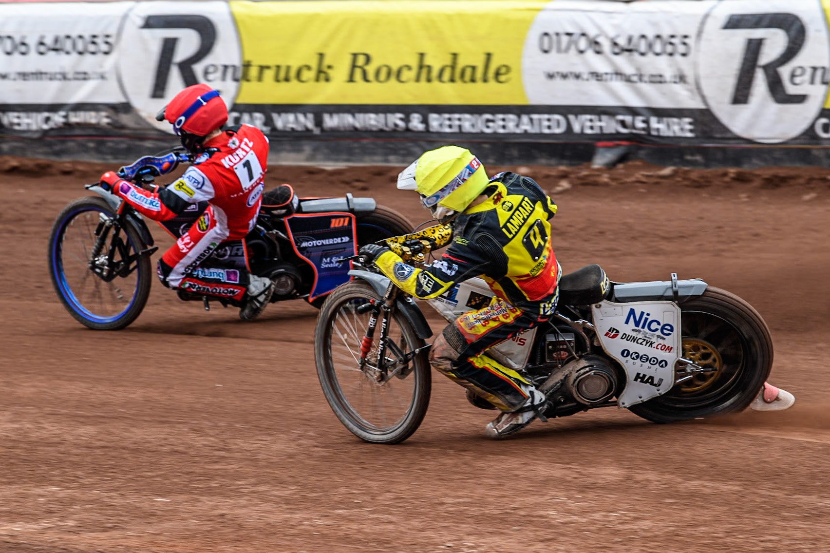 Birmingham Brummies' Wiktor Lampart  in Yellow chases Belle Vue Aces' Brady Kurtz  in Red during the Rowe Motor Oil Premiership match between Belle Vue Aces and Birmingham Brummies at the National Speedway Stadium, Manchester on Monday 6th May 2024. (Photo: Ian Charles | MI News)