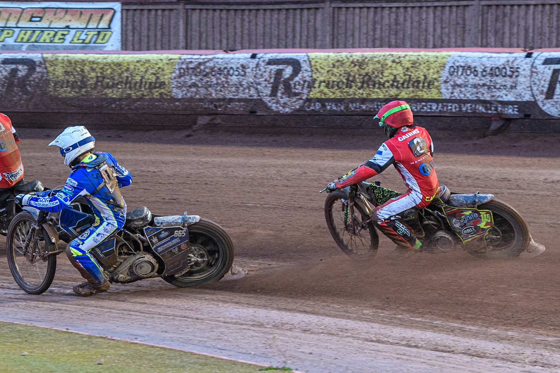 Belle Vue Colts' William Cairns  in Red chases Oxford Chargers' Luke Killeen  in White during the WSRA National Development League match between Belle Vue Colts and Oxford Chargers at the National Speedway Stadium, Manchester on Friday 2nd August 2024. (Photo: Ian Charles | MI News)