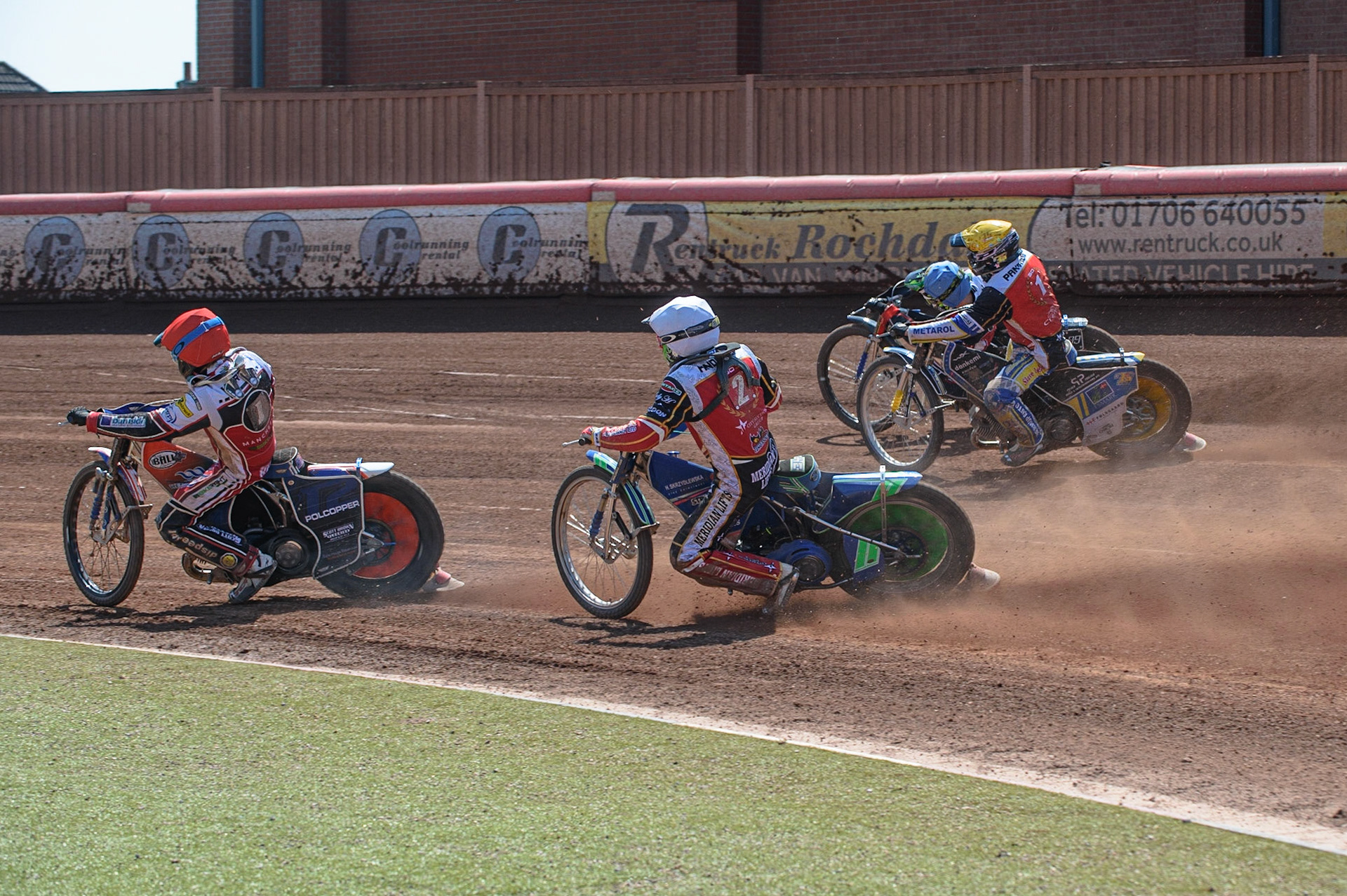 MANCHESTER, UK. MAY 31ST  Brady Kurtz (Red)  leads Hans Andersen (White) as Dan Bewley (Blue) goes around the outside of Bjarne Pedersen (Yellow)during the SGB Premiership match between Belle Vue Aces and Peterborough at the National Speedway Stadium, Manchester on Monday 31st May 2021. (Credit: Ian Charles | MI News)