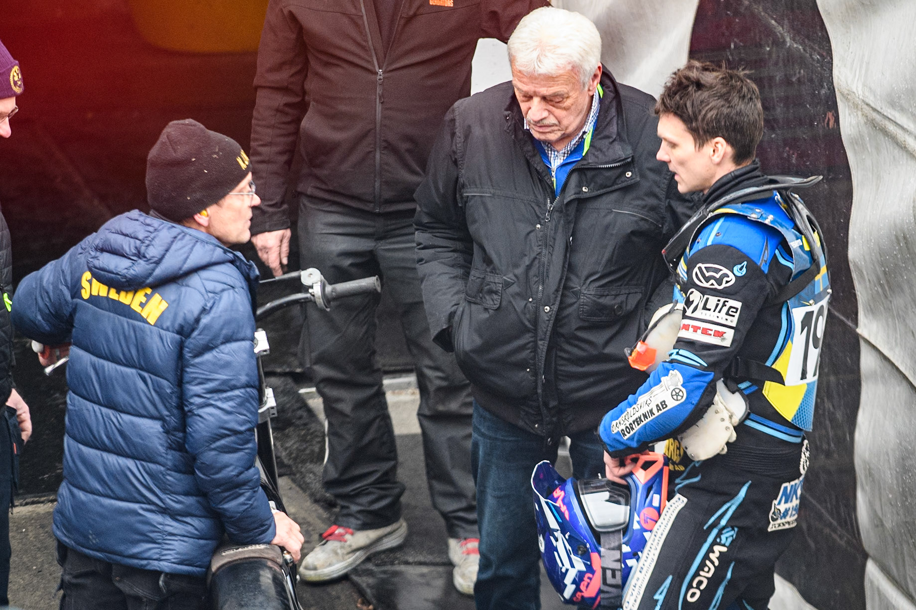 Former rider Stefan Svennson (Left) chats with his son Niklas (192)  during practice for  the Ice Speedway Gladiators World Championship Finals 1 &amp; 2 at Max-Aicher-Arena, Inzell on Friday 14th March 2025. (Photo: Ian Charles | MI News)