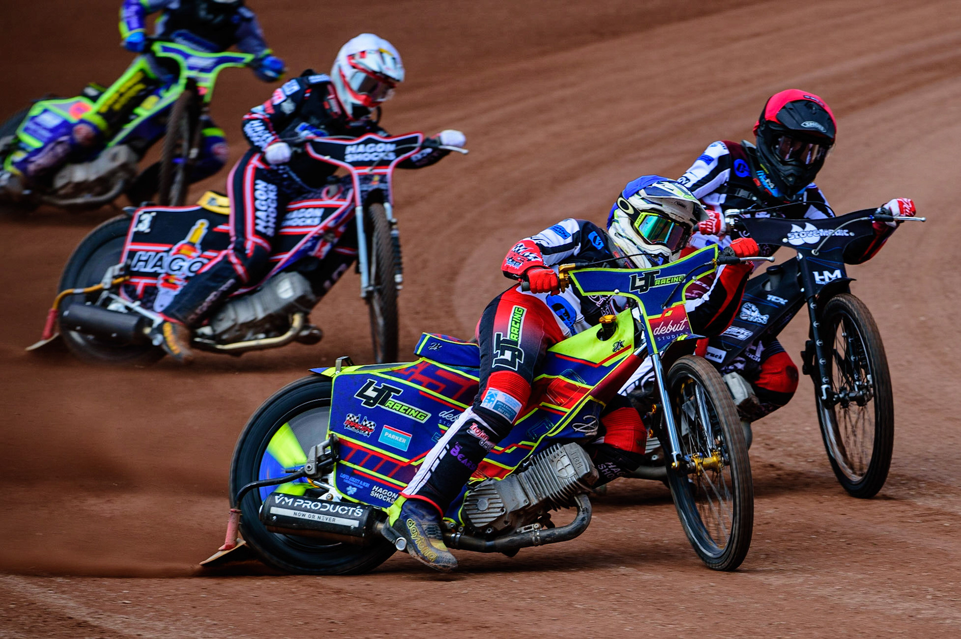 MANCHESTER, UK.  JUN 3RD  Nathan Ablitt  (Blue) leads team mate Harry McGurk  (Red) and Oxford’s Sam Hagon  (White) during the National Development League match between Belle Vue Colts and Oxford Chargers at the National Speedway Stadium, Manchester on Friday 3rd June 2022. (Credit: Ian Charles | MI News)
