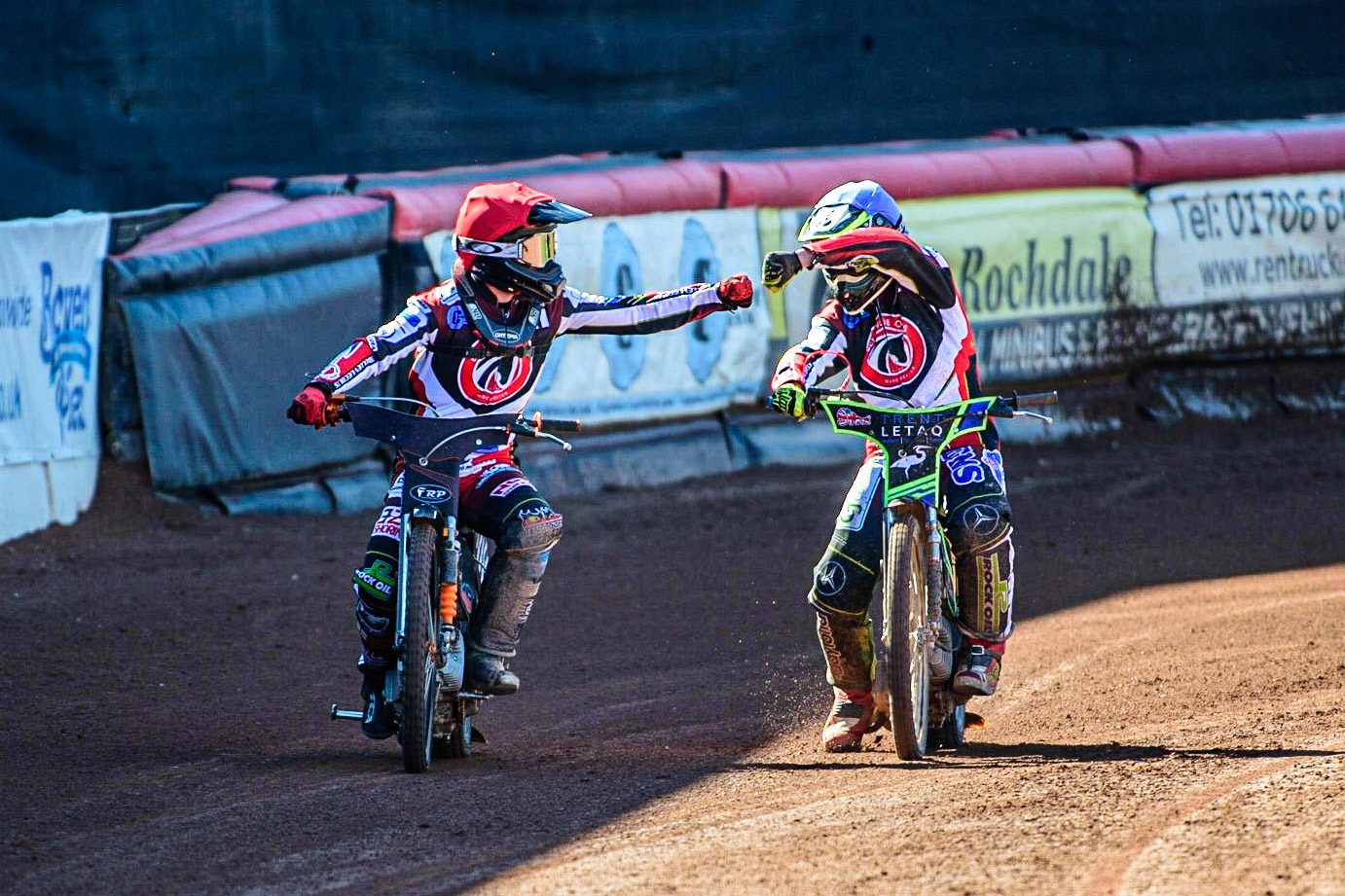 Jack Smith  (Red) and Luke Muff  (Blue) celebrate their win during the National Development League match between Belle Vue Colts and Berwick Bullets at the National Speedway Stadium, Manchester on Friday 7th April 2023. (Photo: Ian Charles | MI News)