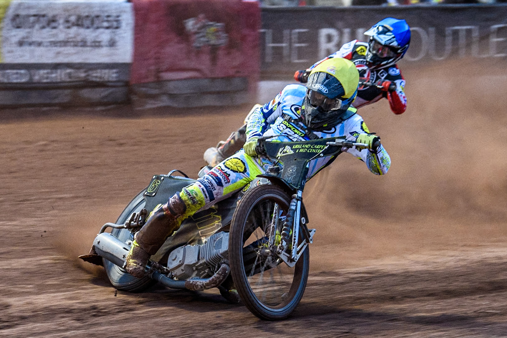 Oxford Spires' Craig Cook in Yellow leading Belle Vue Aces' Connor Mountain in Blue during the Rowe Motor Oil Premiership match between Belle Vue Aces and Oxford Spires at the National Speedway Stadium, Manchester on Monday 13th May 2024. (Photo: Ian Charles | MI News)