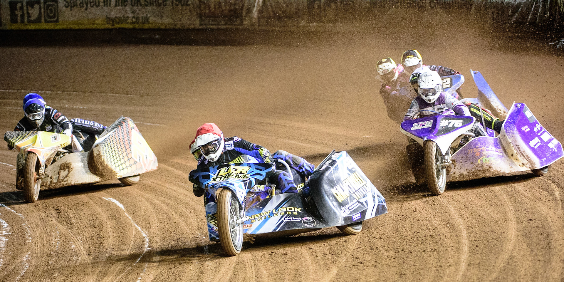 MANCHESTER, UK. OCT 30TH   Matt Tyrell &amp; Liam Brown  (Red) leads Tom Cossar &amp; Wayne Rickards  (Blue) Simon Beaney &amp; Sam Heath (White) and Will Penfold &amp; Ricky Pay  (Yellow) during the Manchester Masters Sidecar Speedway and Flat Track Racing at the National Speedway Stadium, Manchester on Saturday 30th October 2021. (Credit: Ian Charles | MI News)